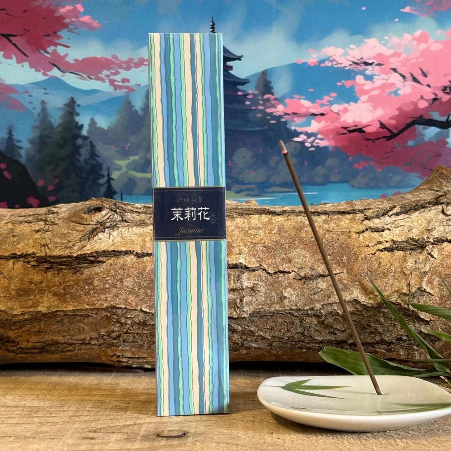 Renowned for using high quality ingredients and a bamboo-free core, these Jasmine incense sticks are beautifully fragranced with the refreshing scent of jasmine flowers.
The incense sticks come beautifully presented in a Paulownia wood box, decorated with a calming blue stripe design, based on traditional kimono fabric. The 40 sticks come with a small incense holder and each stick burns for approximately 25 minutes.