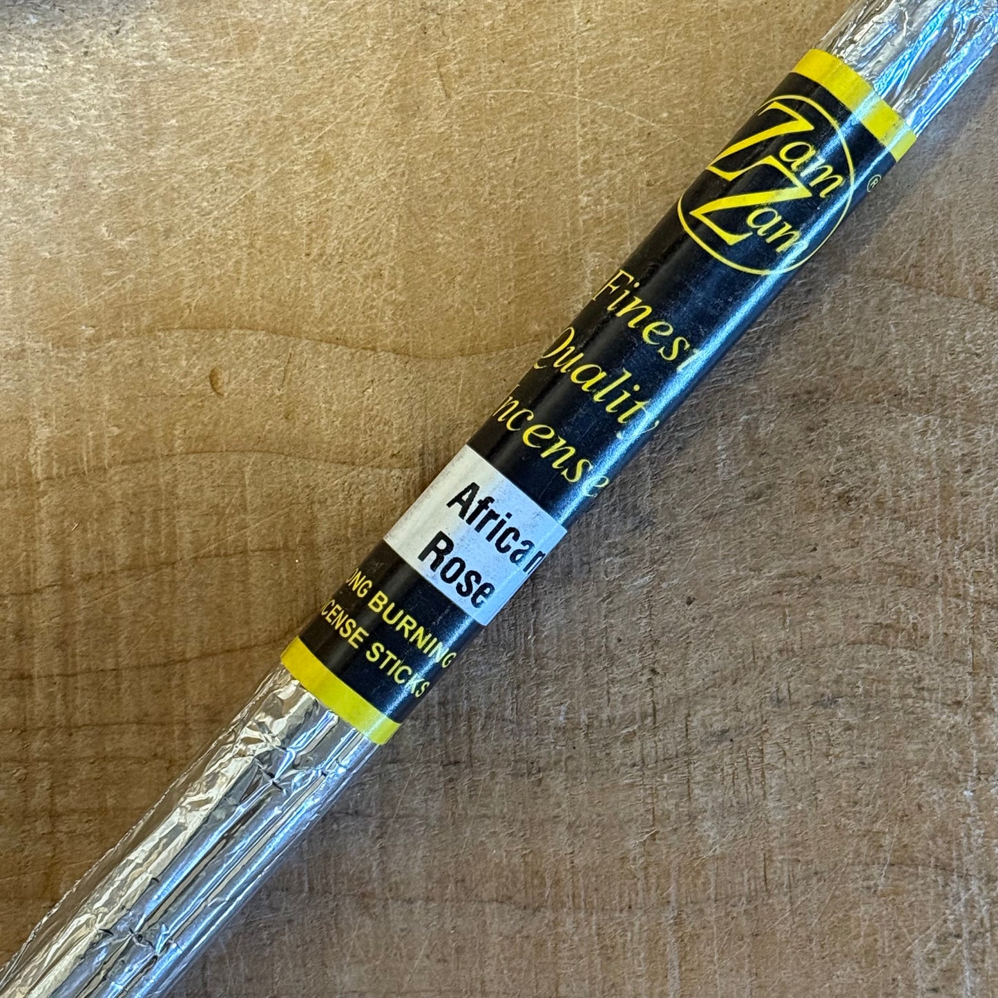 Zam Zam African Rose incense sticks with rich floral aroma. Hand rolled, foil wrapped, long burning incense made with natural oils and bamboo.