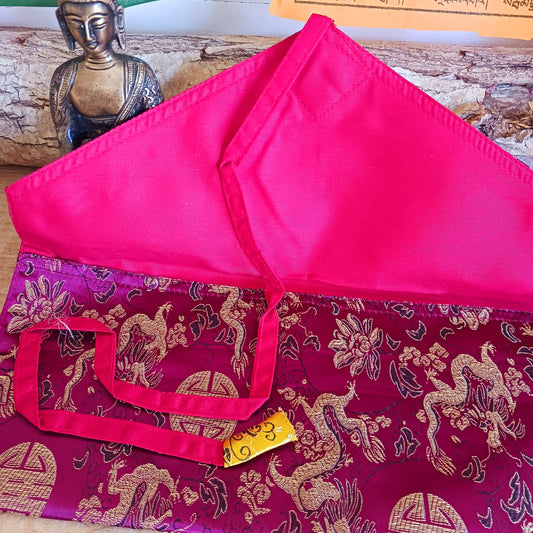 These beautiful prayer book covers are handmade from brocade satin with cotton lining, secured with a ribbon.