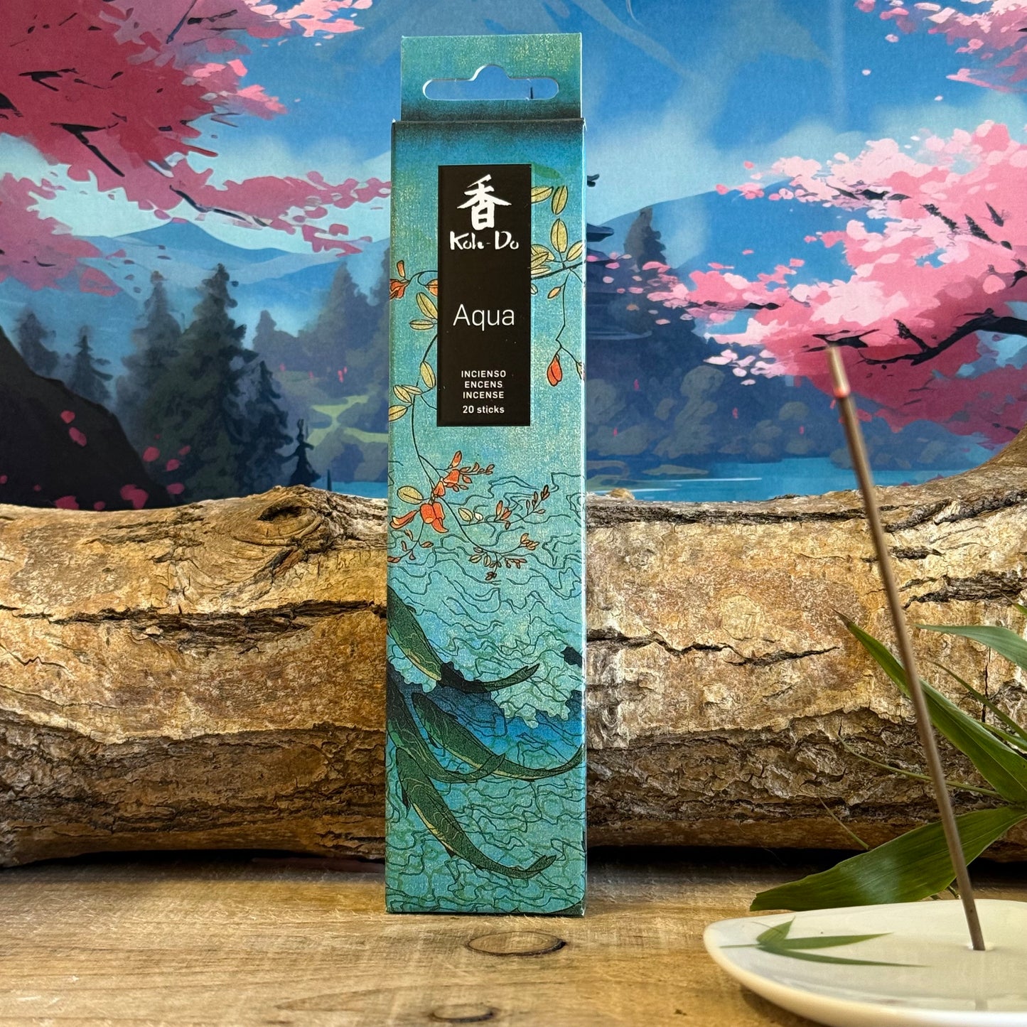 Let the crisp, refreshing aroma of Koh-Do Aqua Incense transport you to a tranquil forest stream kissed by sunlight. With delicate notes of cyclamen, primrose, jasmine, and citrus, this exquisite Japanese incense evokes the airy lightness of a summer breeze. Part of Nippon Kodo’s Ka-fuh range, it produces low smoke, allowing its fresh, floral fragrance to shine without overwhelming your space.