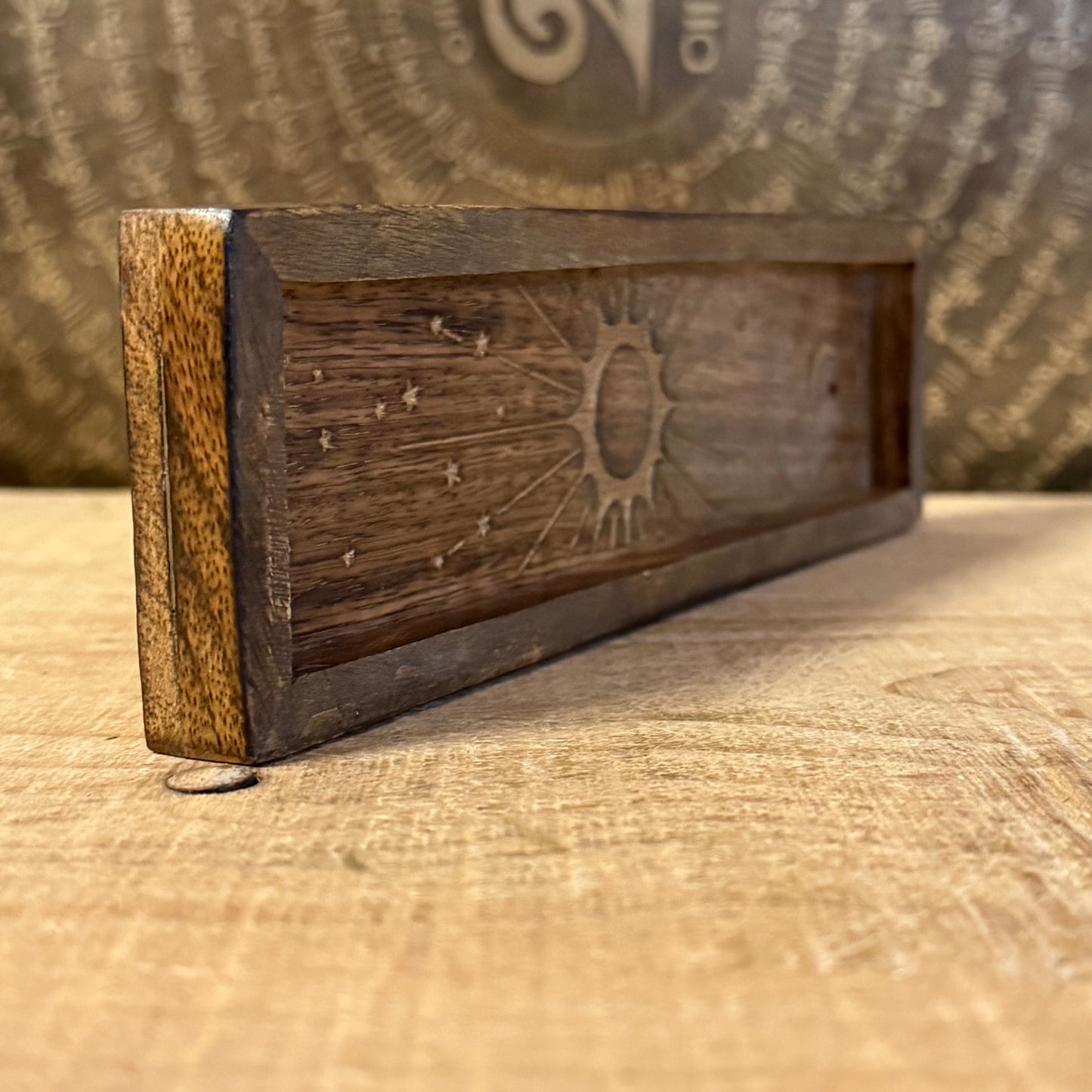 Zodiac incense holder and crystal tray in gold-stamped mango wood. A celestial ritual accessory for incense, crystals, and altar use.