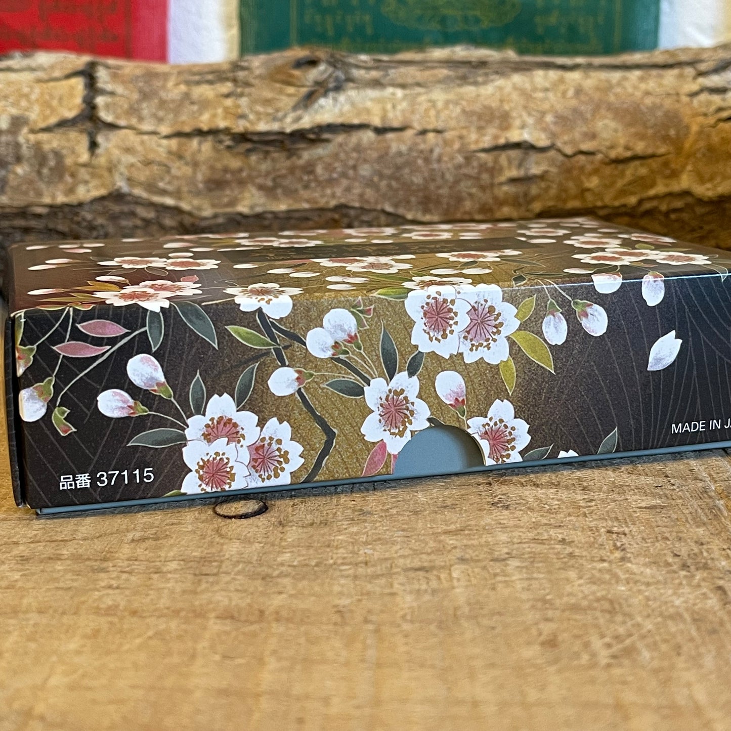 Unochiyo Tokusen Sakura Usuzumi incense is a large box of 380 sticks of incense made in Japan by Nippon Kodo.
The phrase Tokusen Sakura Usuzumi translates into English as, “Excellent Cherry Blossom Pale Grey”. Cherry blossoms are revered in Japan and as the blooms go over they develop into a pale grey colour – which the Japanese people believe brings a sense of peace. 