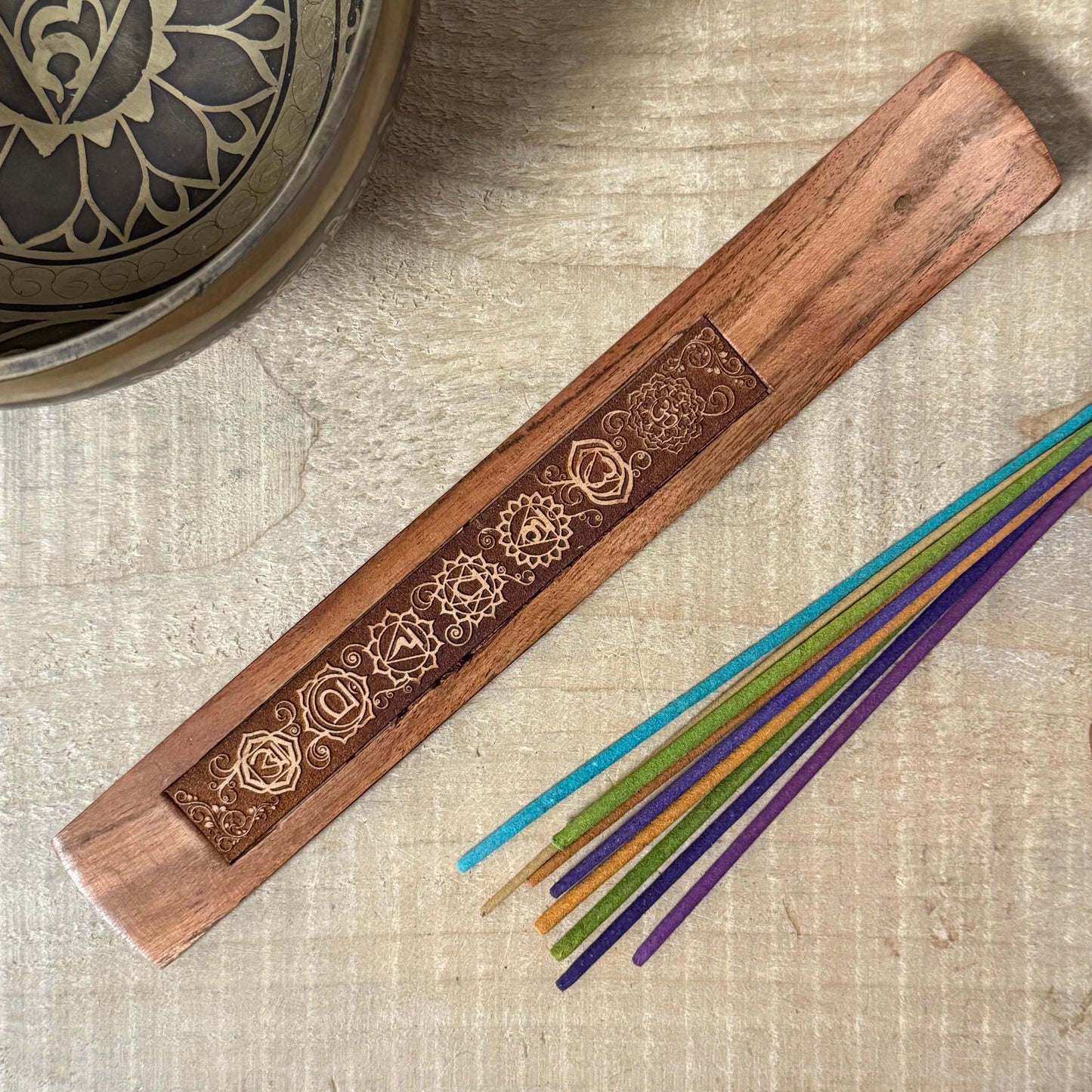 Handcrafted wooden incense holder with Seven Chakra carvings for chakra alignment, meditation, and spiritually inspired incense rituals.