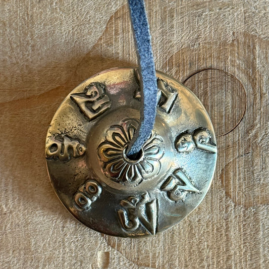 Om Mani Padme Hum Tingsha cymbals for meditation and rituals. Handmade in Nepal, engraved with sacred mantra, perfect for altars and spiritual practice.