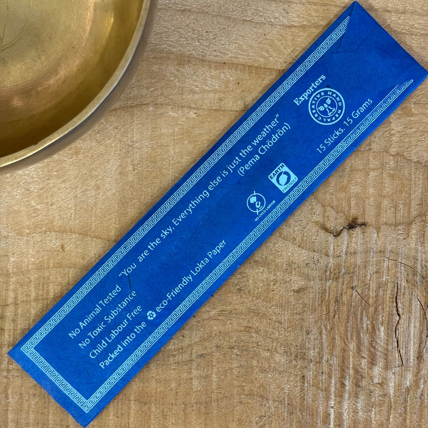 Moon Glory Flora handmade Nepalese incense in Lokta paper with Himalayan flower decoration.