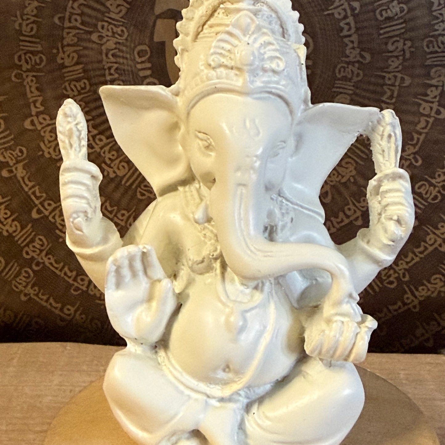 Bring luck and wisdom home with this 11cm Ganesh Statue. The four-armed elephant god symbolizes prosperity, protection, and spiritual success.