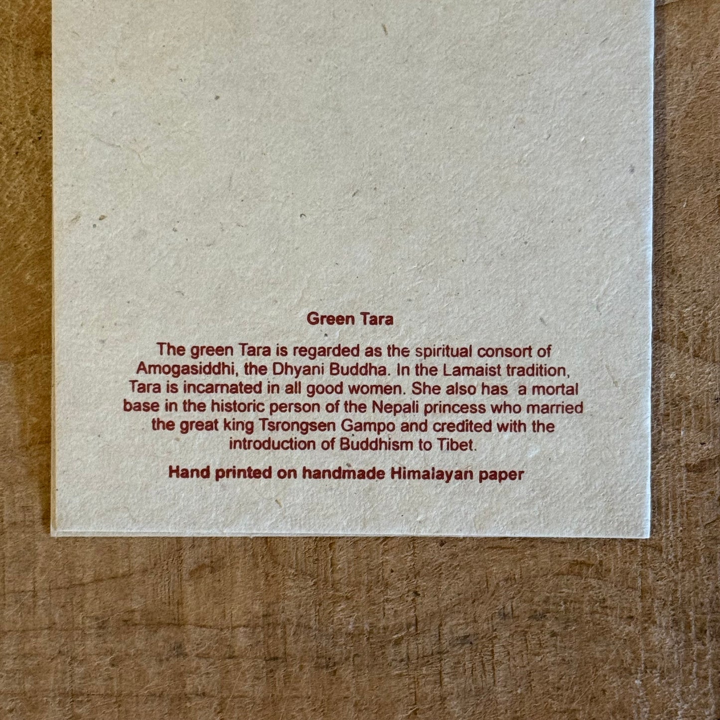 Invoke the swift compassion of Green Tara with this handcrafted Lokta Paper Greeting Card. Created by master artist Jimmy Thapa, each card is made using traditional Himalayan Lokta fibre, offering a sustainable and spiritually resonant finish. Blank inside with a matching envelope, it is ideal for blessings, celebrations, and meaningful correspondence. Natural colour and size variations reflect its handmade origin. Approx. 11 x 15 cm.