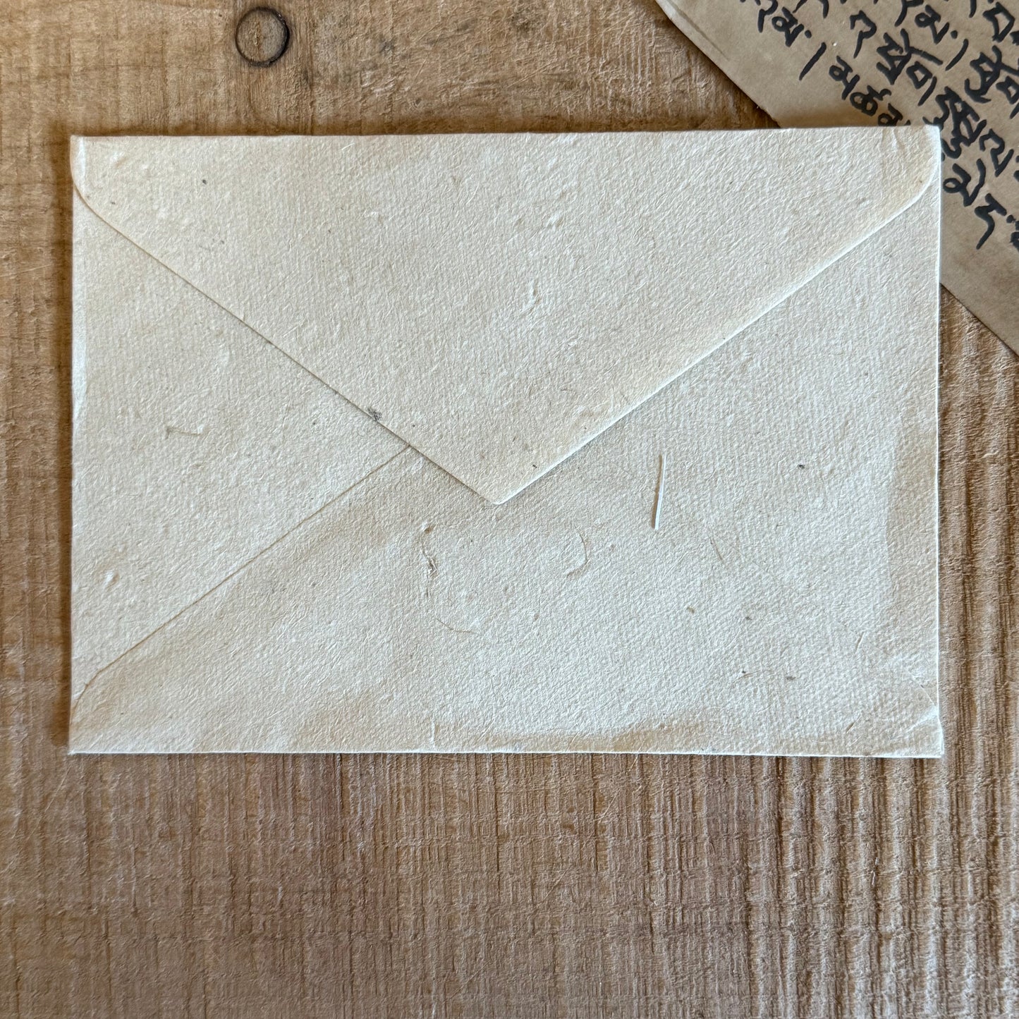 Beautifully coloured and decorated greetings card, made from Lokta paper, featuring Guru Padmasambhav.
Lokta paper making is a traditional practice from the high altitude Himalayan forests of Nepal. The Lokta bush is a fast growing shrub and the paper making process helps to provide economic stability for some of Nepal's poorer rural people.
Size: approx. 15.5 x 11.5 cm
☸Buddhist design Lokta paper card with envelopes
☸Made from a sustainable plant source
☸Handmade and Fairtrade from Nepal