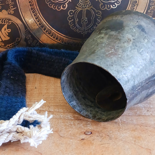 Bring the authentic charm of the Himalayas into your home with this handcrafted Nepalese Yak Bell. Traditionally used by yak herders in Nepal and Tibet, these distinctive bells were hung around the necks of yaks to help locate animals grazing across mountainous landscapes.