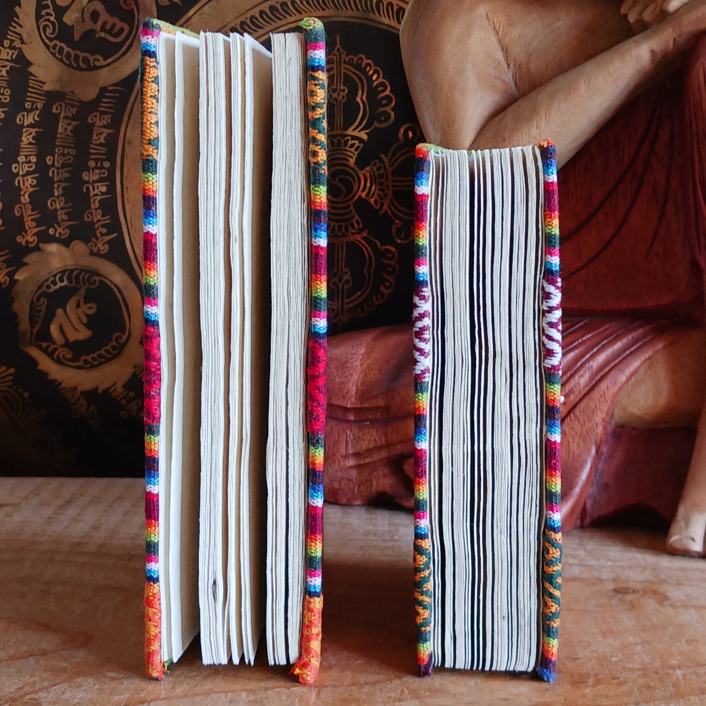 These beautifully handmade note books have a traditional Bhutani hard back cotton cover and pages inside made from Lokta paper. The "Lokta" paper is made of Daphne paper, hand made using a traditional method without involving any mechanical equipment, and no chemicals are used.