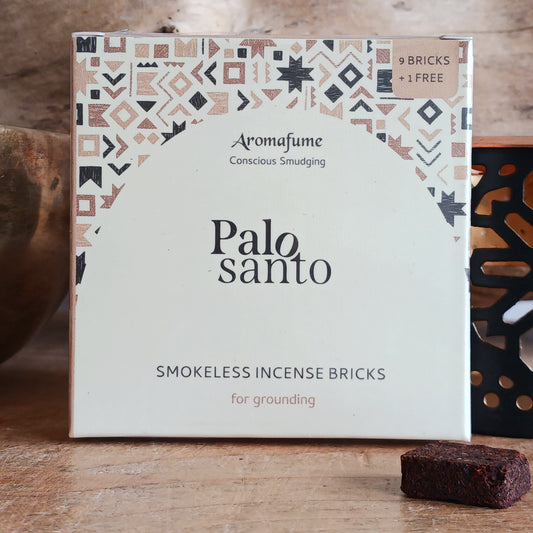 Aromafume Palo Santo Incense Bricks are a natural, non-toxic incense designed for use with a compatible incense diffuser. Infused with the sacred aroma of palo santo, known as “holy wood,” this incense releases a warm, woody fragrance with soft citrus undertones when gently heated.