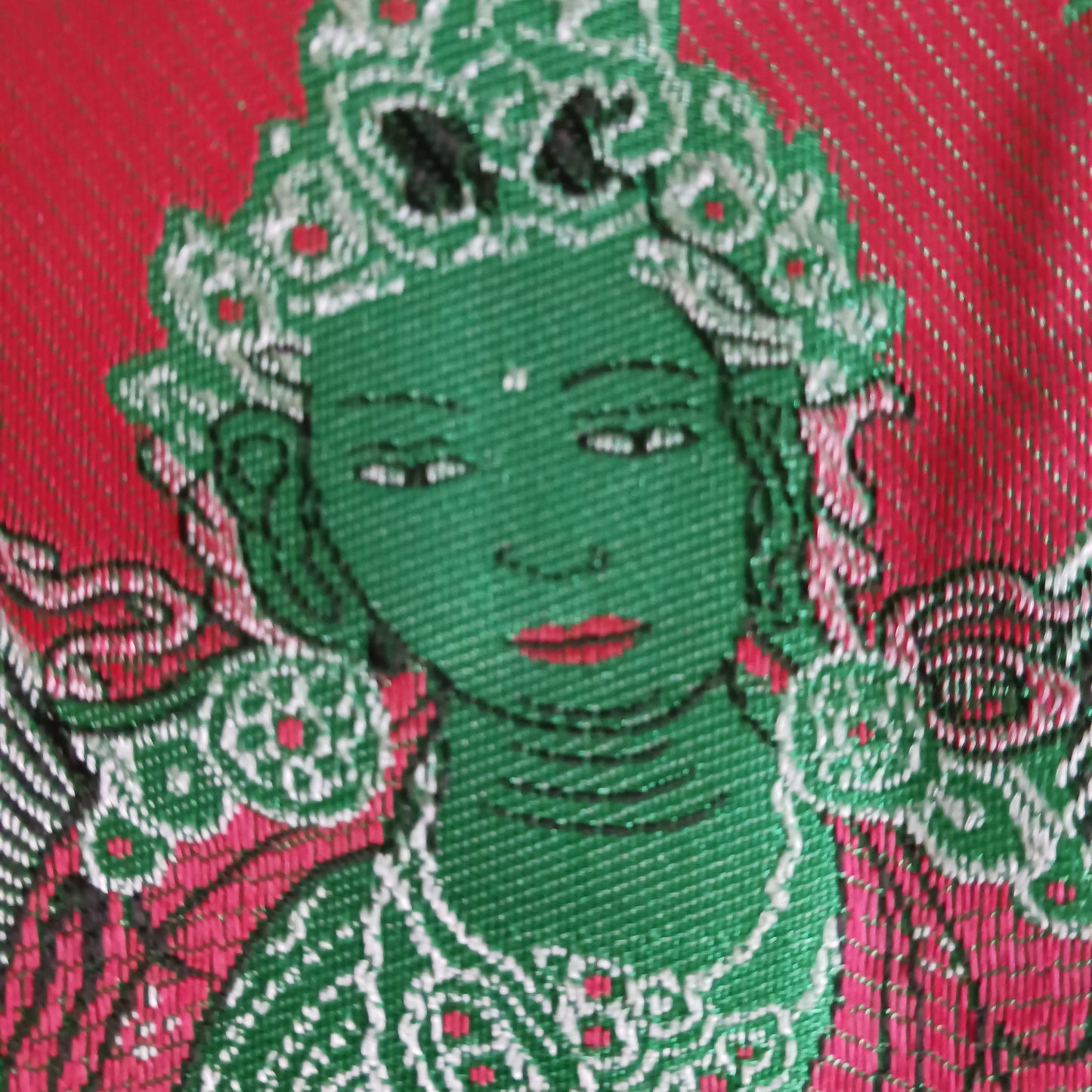 Bring serenity, beauty, and spiritual inspiration into any space with this Handmade Embroidered Green Tara Thangka, crafted by skilled artisans in Nepal. Each piece is created using traditional techniques passed down through generations, featuring intricate embroidery and a rich brocade border that highlights the calm and compassionate presence of Green Tara.