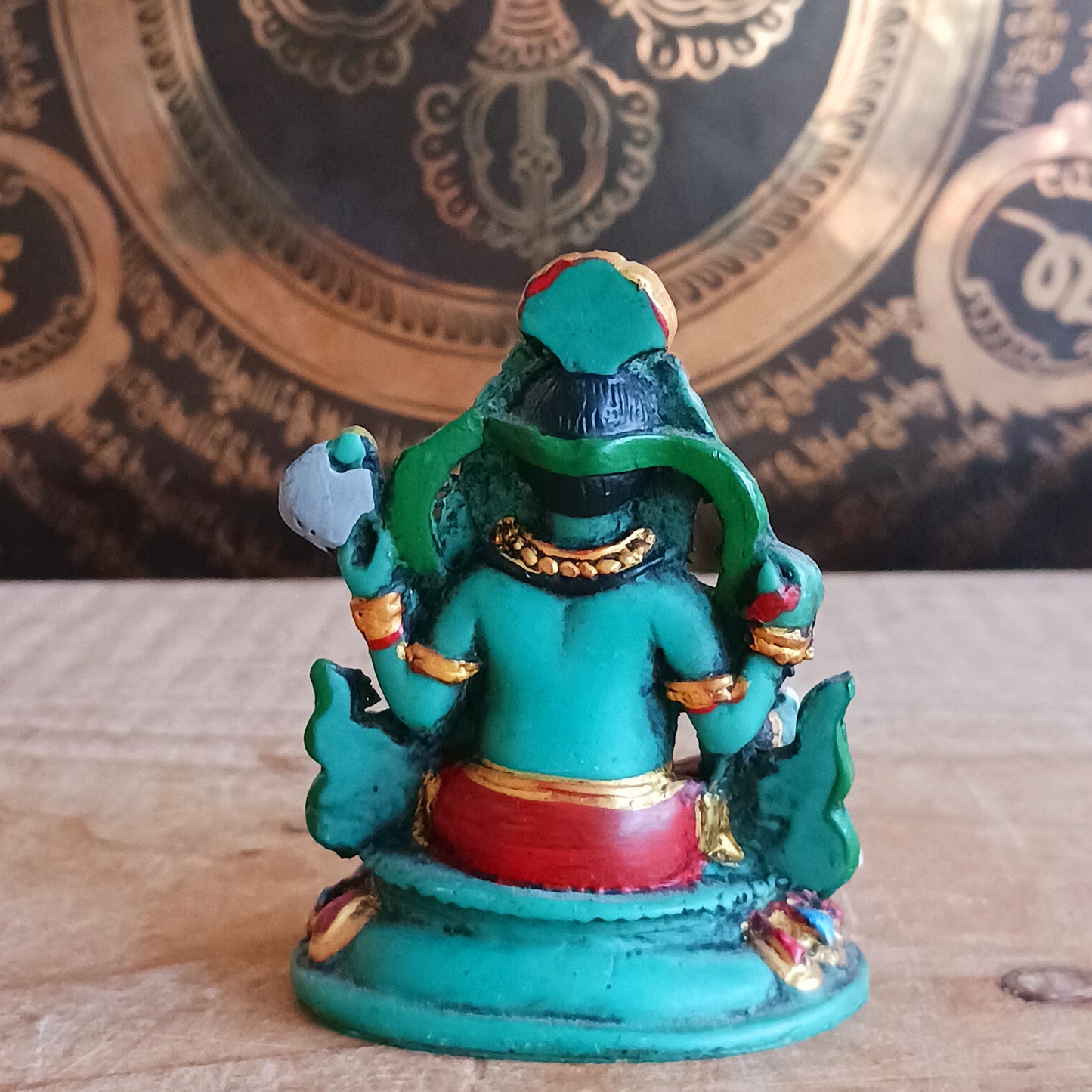 Bring the wisdom and prosperity of Lord Ganesh into your home with this intricately hand-painted resin figurine. Known as the remover of obstacles and the patron of arts and sciences, Ganesh is celebrated for his intellect, wisdom, and guidance.