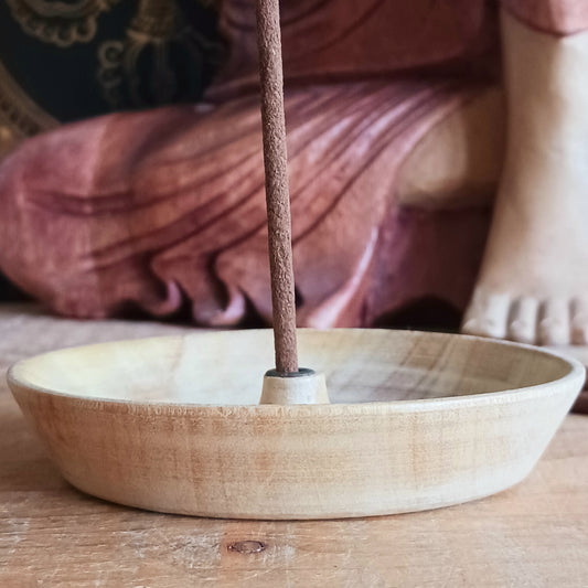 Bring a touch of Himalayan craftsmanship into your space with this beautifully hand-carved incense holder, crafted from a single piece of yellow wood sourced in Nepal. Each piece is skilfully shaped by local artisans, giving it its own natural character and charm.