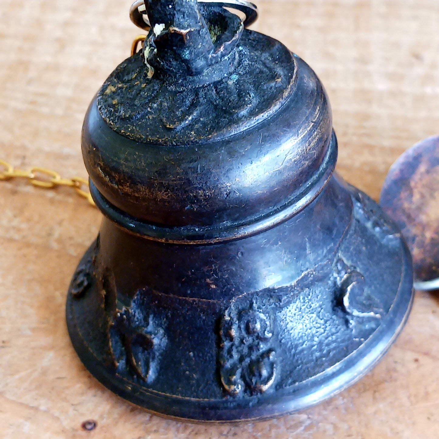 Bring a sense of peace and tradition to your home or garden with this beautifully handcrafted Brass Temple Hanging Bell with Bodhi Leaf. Made by skilled artisans in Nepal using traditional techniques, this elegant bell features a classic temple bell design paired with a decorative brass Bodhi leaf, a symbol of wisdom, enlightenment, and spiritual growth.