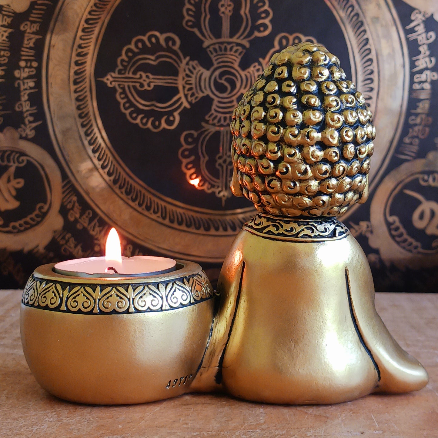 Bring a sense of peace and mindfulness into your home with this elegant Gold Buddha Tealight Candle Holder. Featuring a beautifully crafted praying Buddha figure alongside a tealight holder, this decorative piece creates a calming ambiance wherever it is placed.
