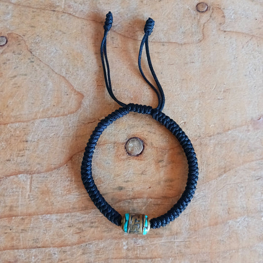 Experience the timeless beauty and spiritual symbolism of this handcrafted Tibetan Mantra Rope Bracelet. Each bracelet is skilfully woven with high-quality braided cord, designed to be durable, lightweight, and comfortable for daily wear.