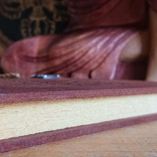 Capture your thoughts, ideas, and inspirations in this beautifully crafted hard-covered notebook. Featuring a hinged design and filled with eco-friendly recycled Lokta paper, it’s perfect for jotting down notes on the go. Each notebook is elegantly engraved with the Om symbol on the front cover, adding a touch of mindfulness and serenity to your writing. Ideal for journaling, sketching, or as a thoughtful gift for loved ones.