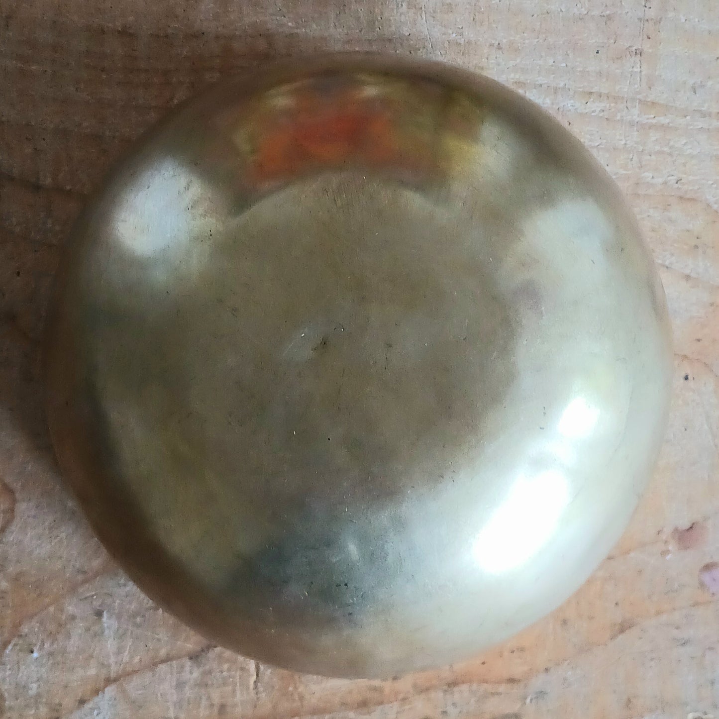 Elevate your meditation and sound healing practice with this Classic Hand-Hammered Singing Bowl, beautifully engraved with the sacred OHM symbol inside the bowl. This is a unique, one-of-a-kind item—you will receive exactly the bowl pictured.