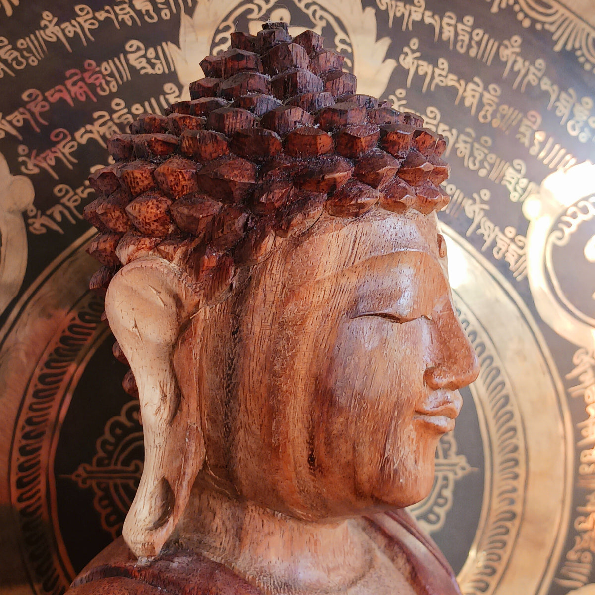 Bring a sense of peace, serenity and mindfulness into your home with this beautiful large Hand Carved Wooden Meditating Buddha Statue. Traditionally crafted in Bali from sustainable Suar wood, each statue is a unique work of art, showcasing the natural beauty of the wood and the skill of the artisan.