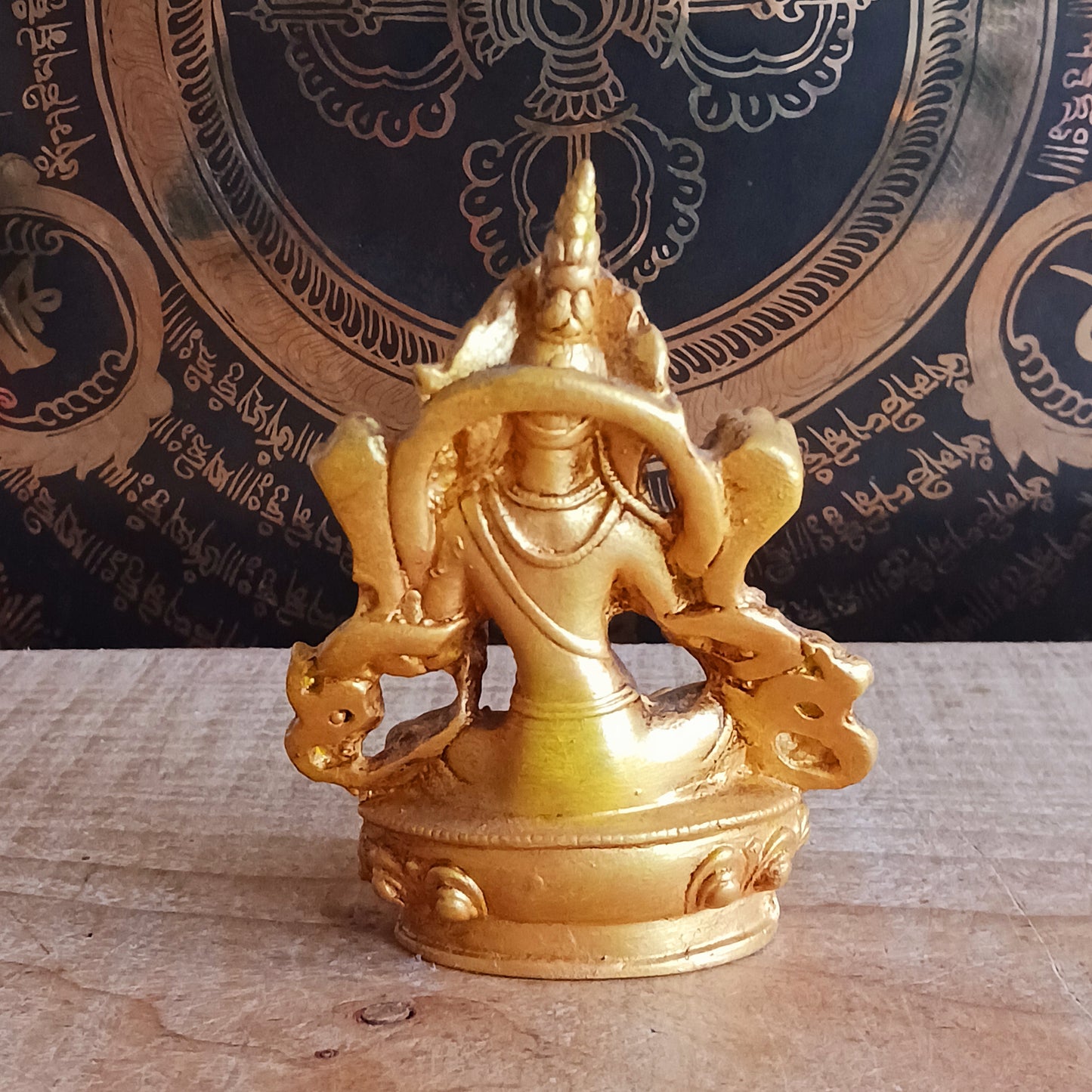 Bring peace, protection, and positive energy into your space with this exquisite Hand-Painted Gold Resin Green Tara Statue.