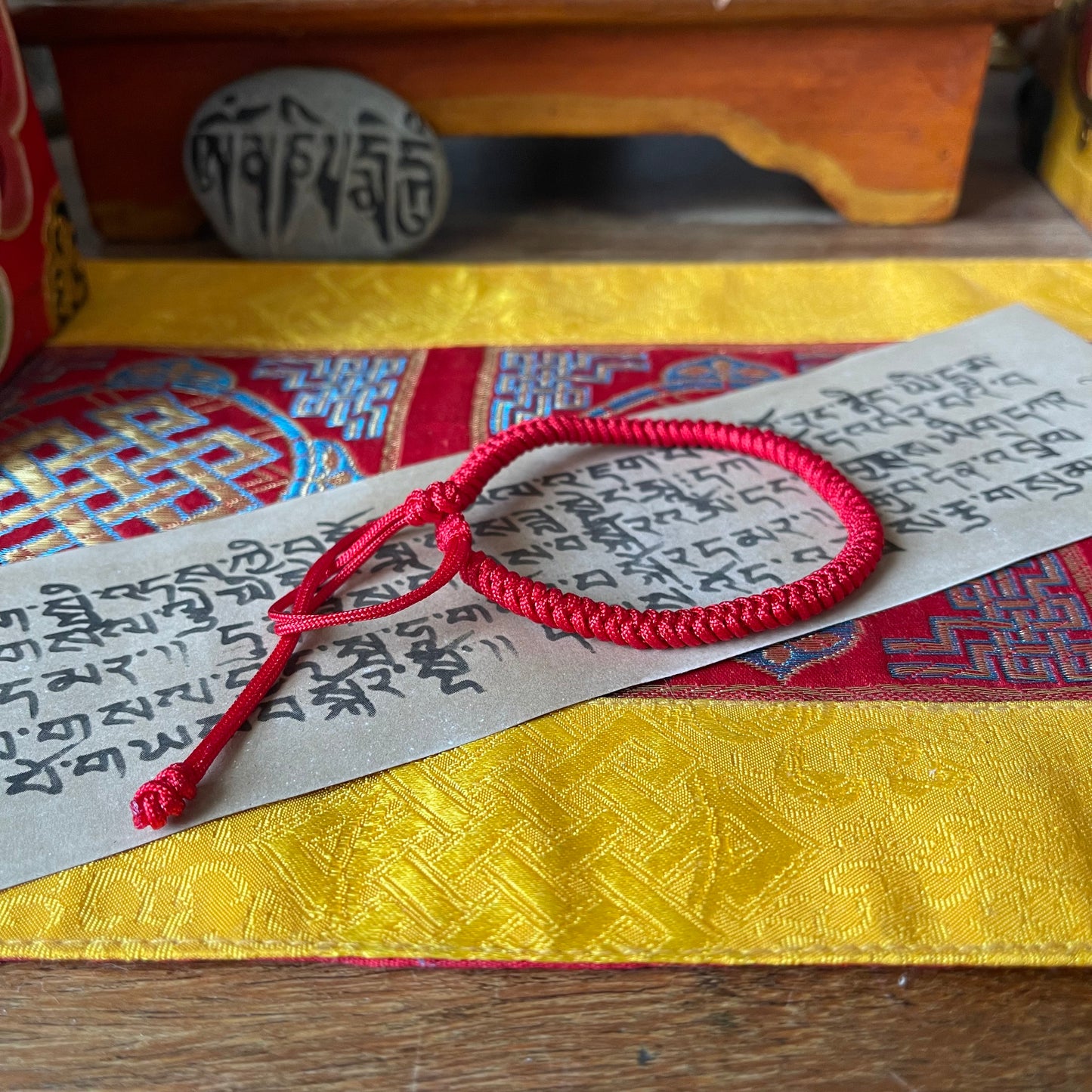 Lucky Tibetan Red Cord bracelet with Nepalese Pouch