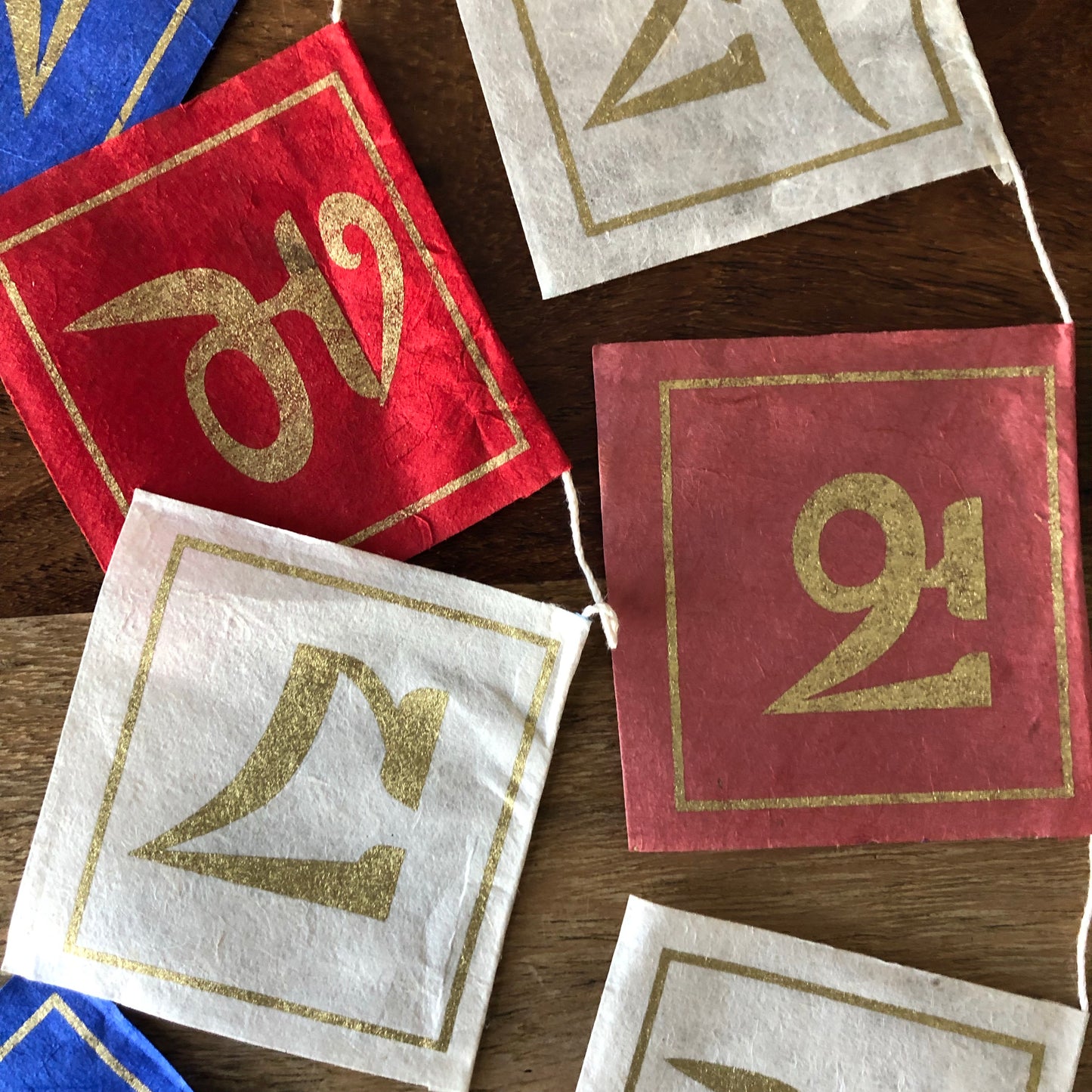 Om Mantra tiny paper prayer flags- 25 leaf