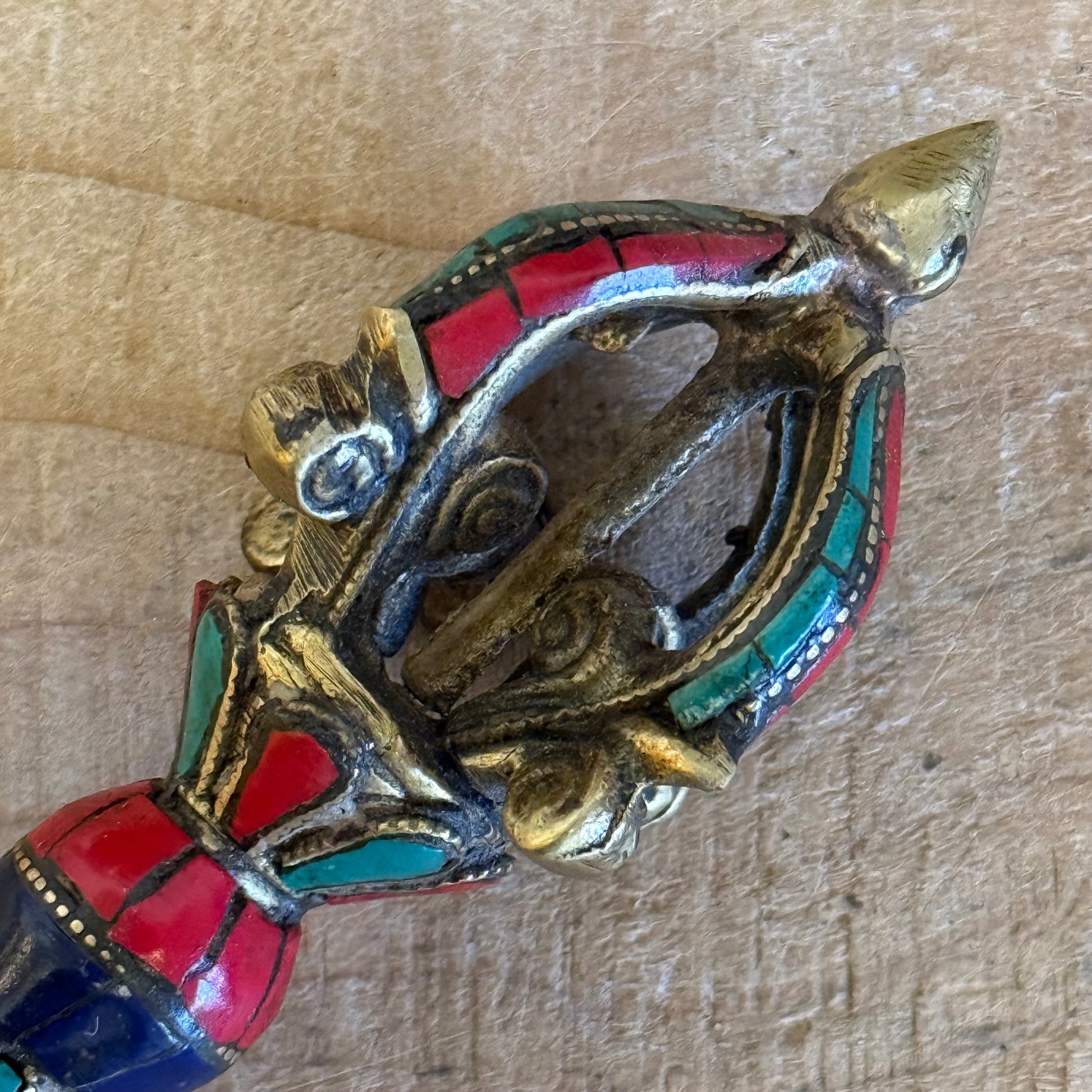 Handmade Flower Dorje ritual vajra in solid brass with turquoise inlay. Sacred Tibetan Buddhist altar object for meditation and ritual practice.