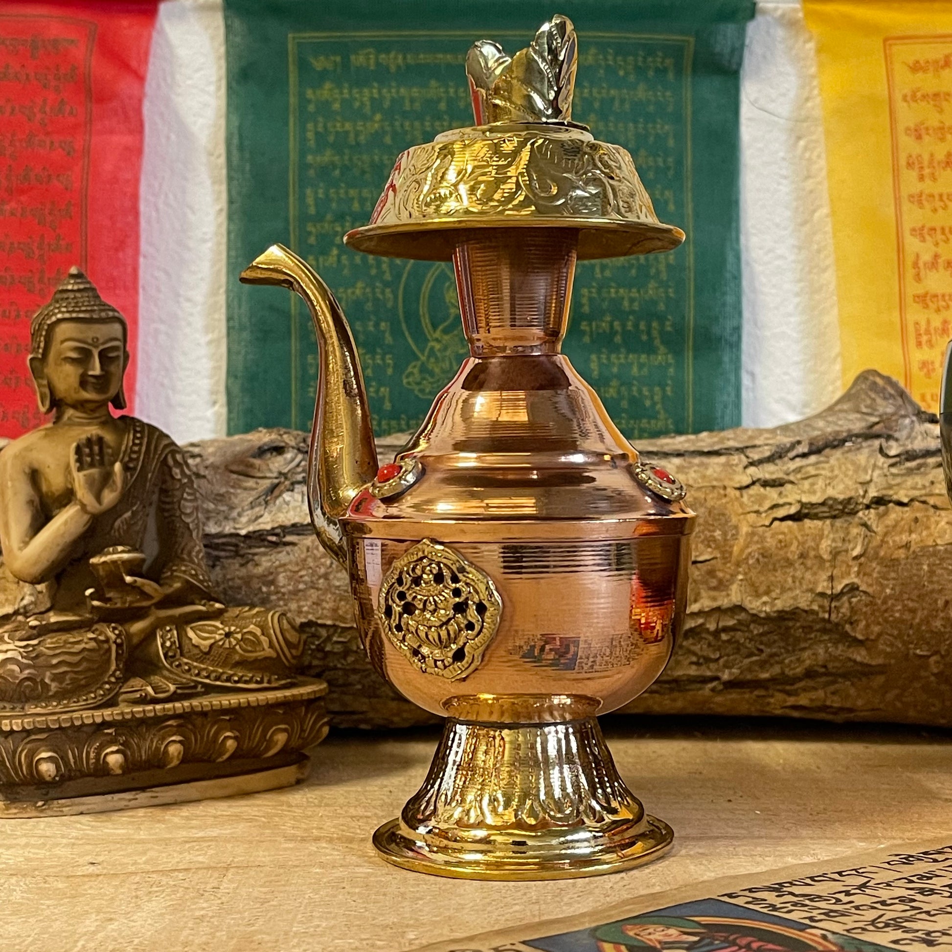 The Bhumpa, or Ritual Vase, is an important ceremonial item used for holding holy water that has been blessed by the Guru. The holy water is believed to remove negativity and to chase away evil spirits, and it is sprinkled or poured to purify persons, places or objects. Bhumpas are widely used by Gurus in many types of ceremonies, from elaborate purification rituals&nbsp;for new houses, monuments and holy sites, to simple blessings for disciples meant to purify and protect them from harmful&nbsp;forces. Bhu