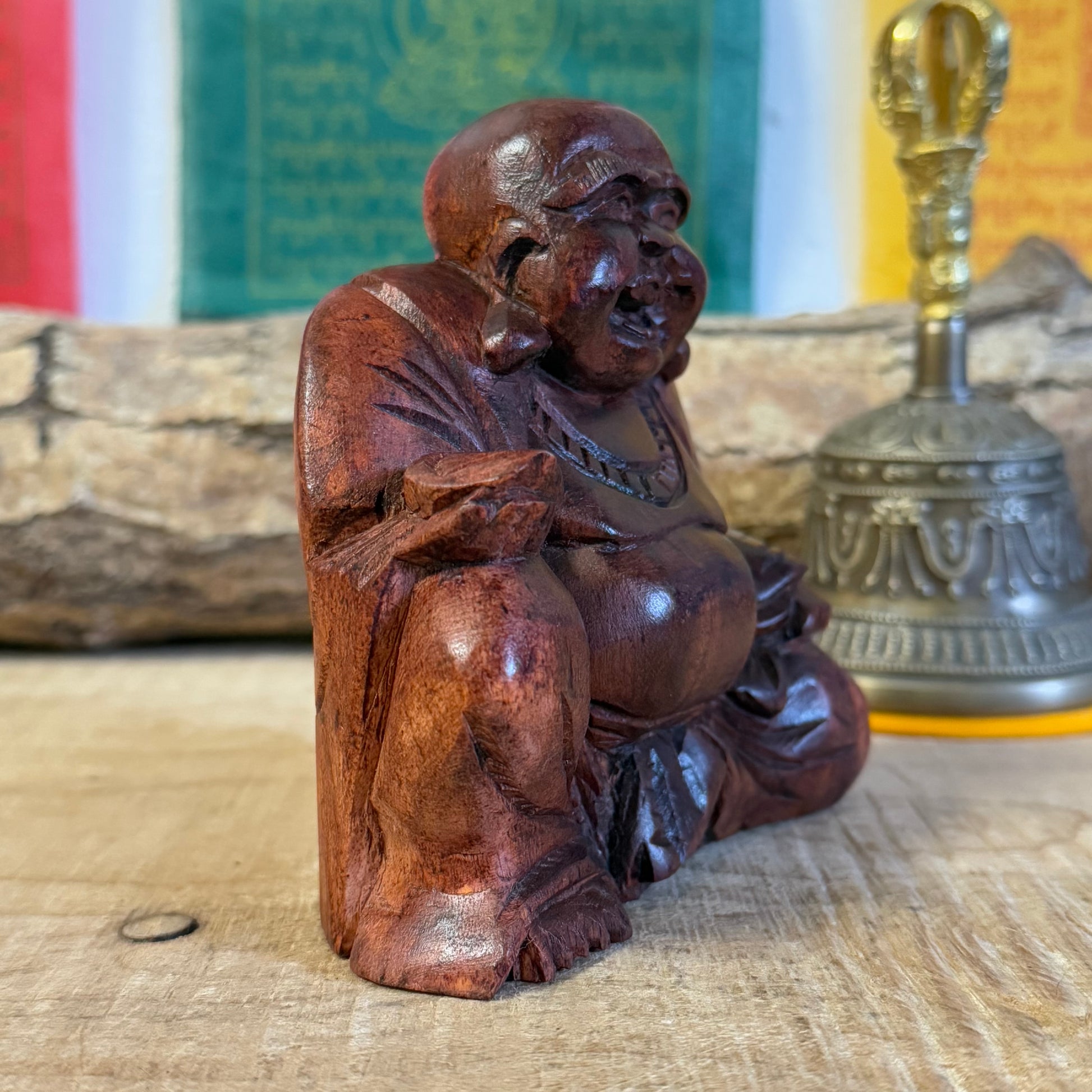 Invite joy & prosperity with our hand-carved Solid Laughing Buddha statue, crafted from durable Raintree wood. Perfect for home decor, meditation spaces, or meaningful gifts. Shop now