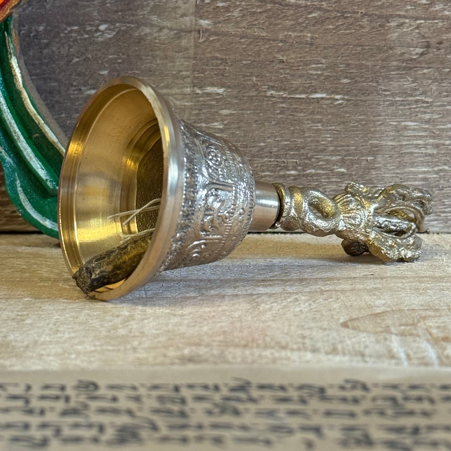 The Medium Tibetan Tingsha Bell is a sacred sound instrument, handcrafted with devotion and precision by skilled Tibetan artisans. Measuring 6 x 11.5 cm, it carries the essence of ancient mindfulness and Tibetan spiritual traditions.