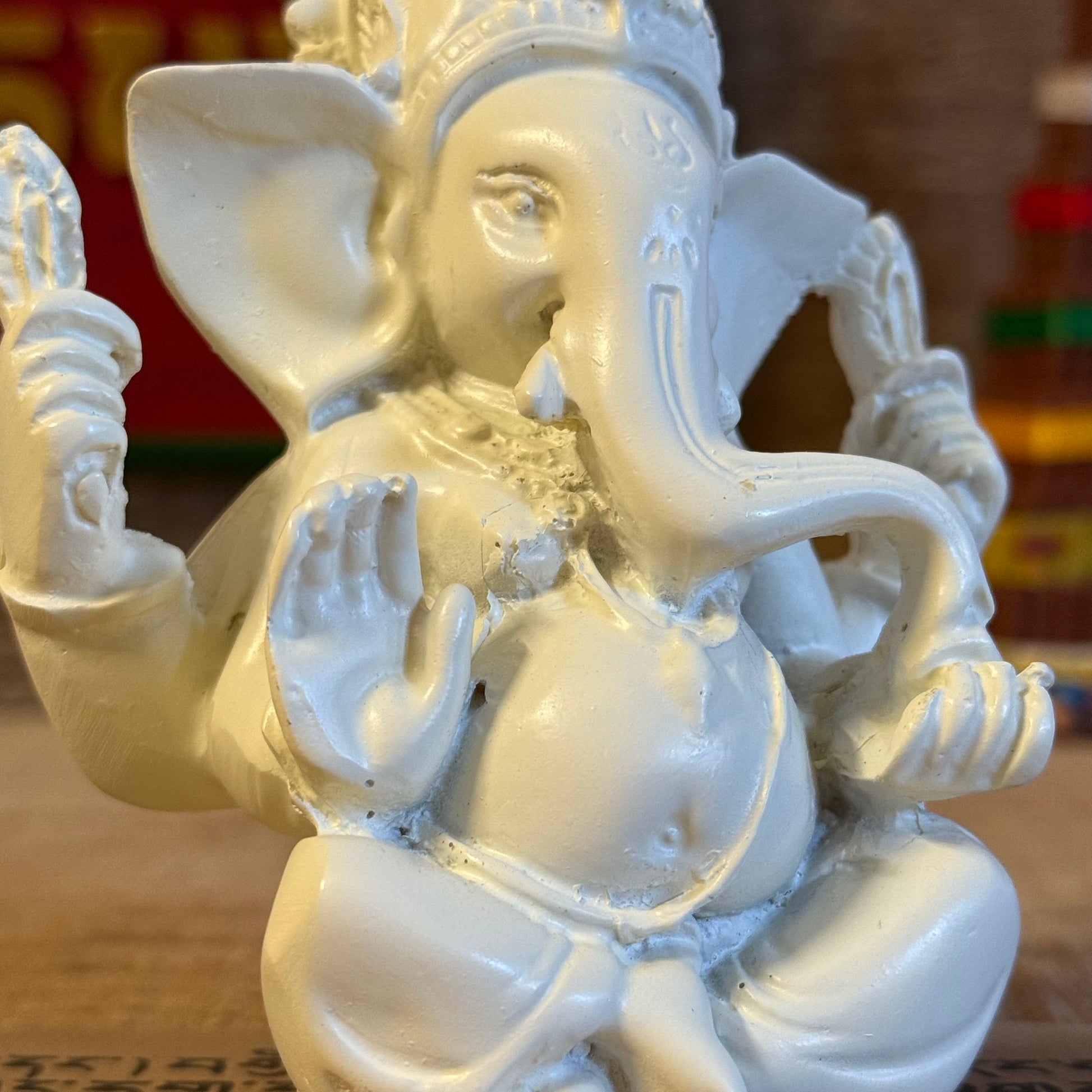 Invite blessings and good fortune into your home with this beautiful statue of Lord Ganesh, the revered elephant-headed god of wisdom, success, and prosperity. Handcrafted from durable poly resin and standing approximately 11cm tall, this piece captures Ganesh’s serene expression and four symbolic arms, each representing divine power and protection.