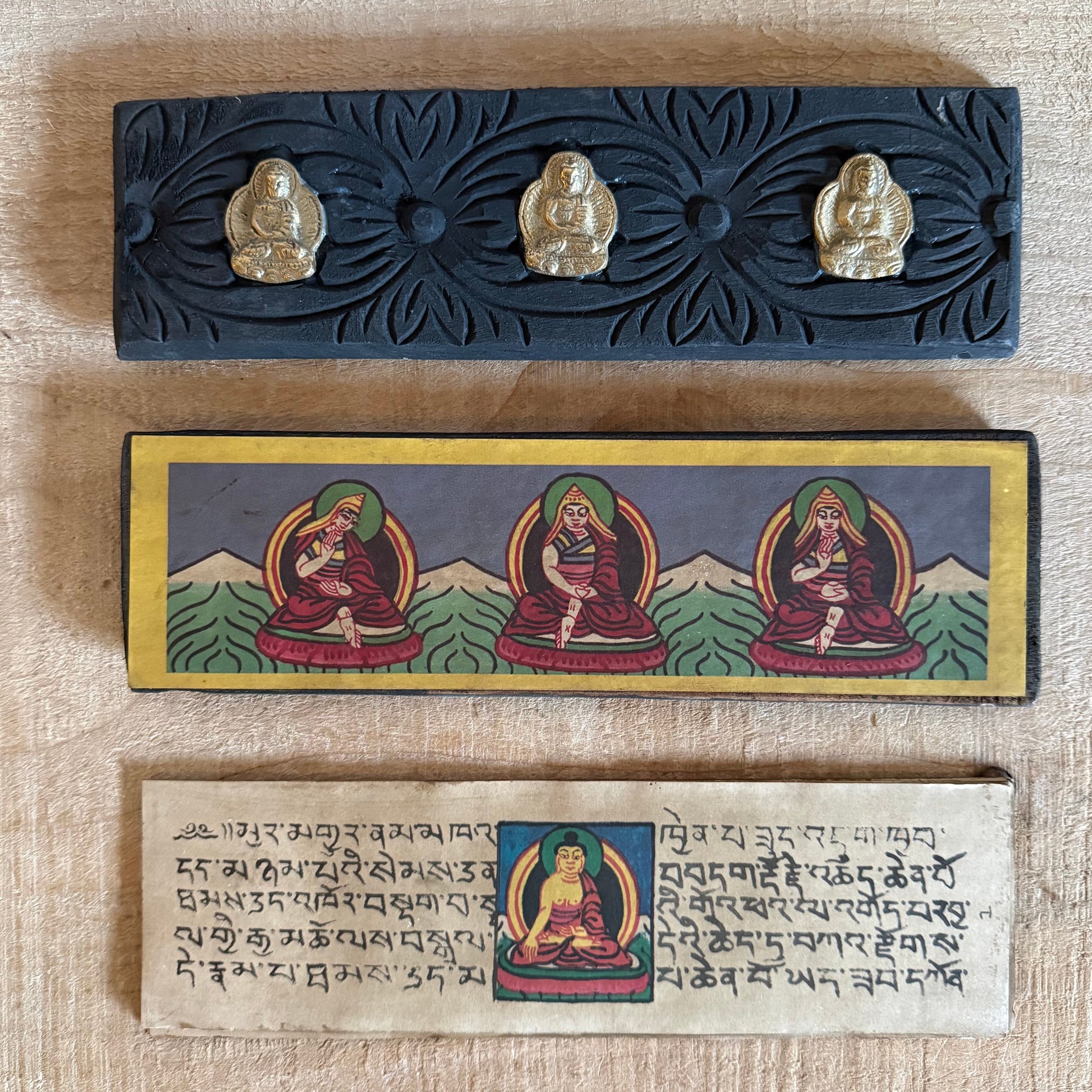 Handmade Tibetan Deity Mantra Prayer Book with hand-painted Buddha, handwritten prayers on Daphne bark paper. Perfect for meditation, altar, and blessings.
