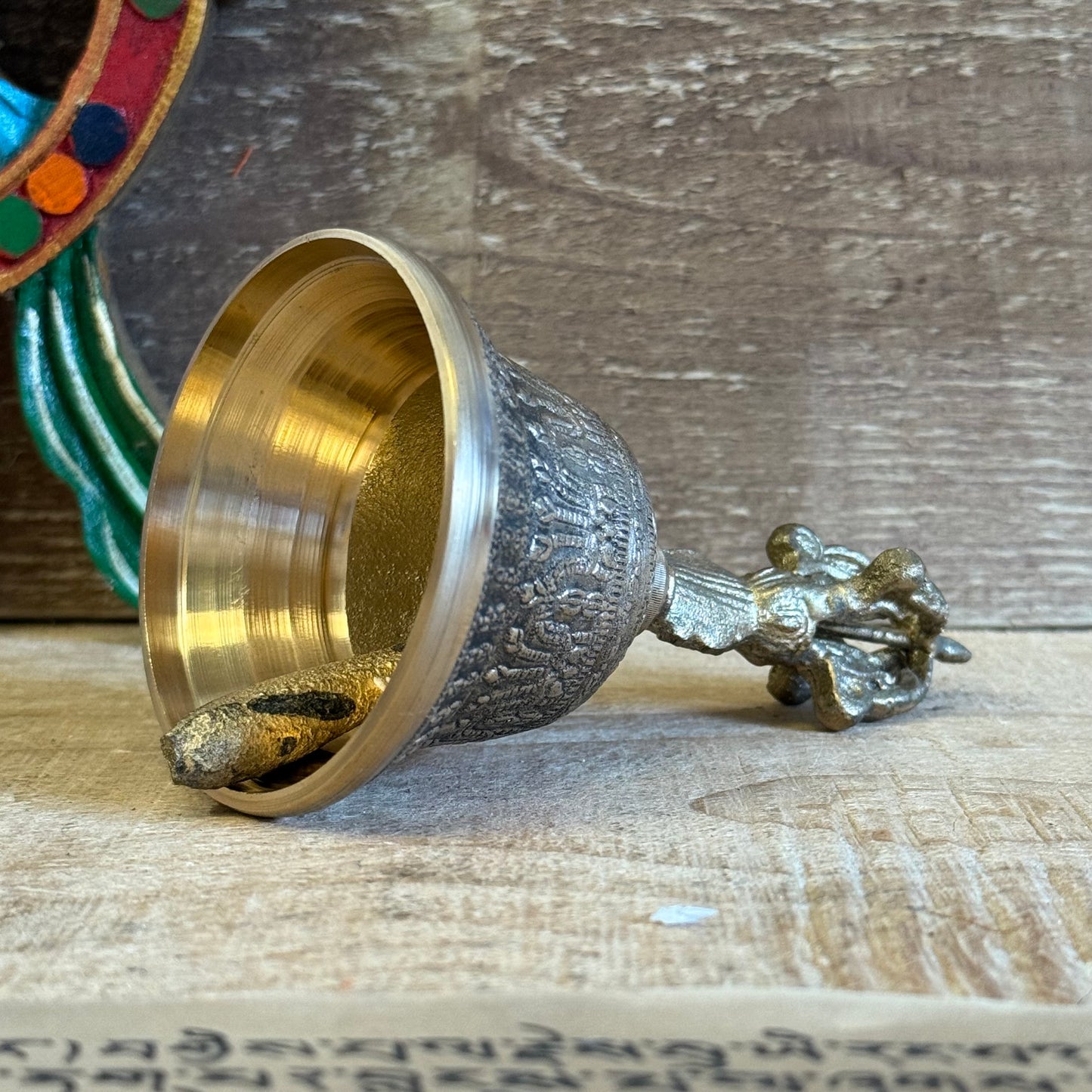 The Large Tibetan Tingsha Bell is a sacred sound instrument, handcrafted by devoted Tibetan artisans with precision and care. Measuring 7.5 x 13 cm, it carries the essence of centuries-old mindfulness practices and Tibetan spiritual traditions.