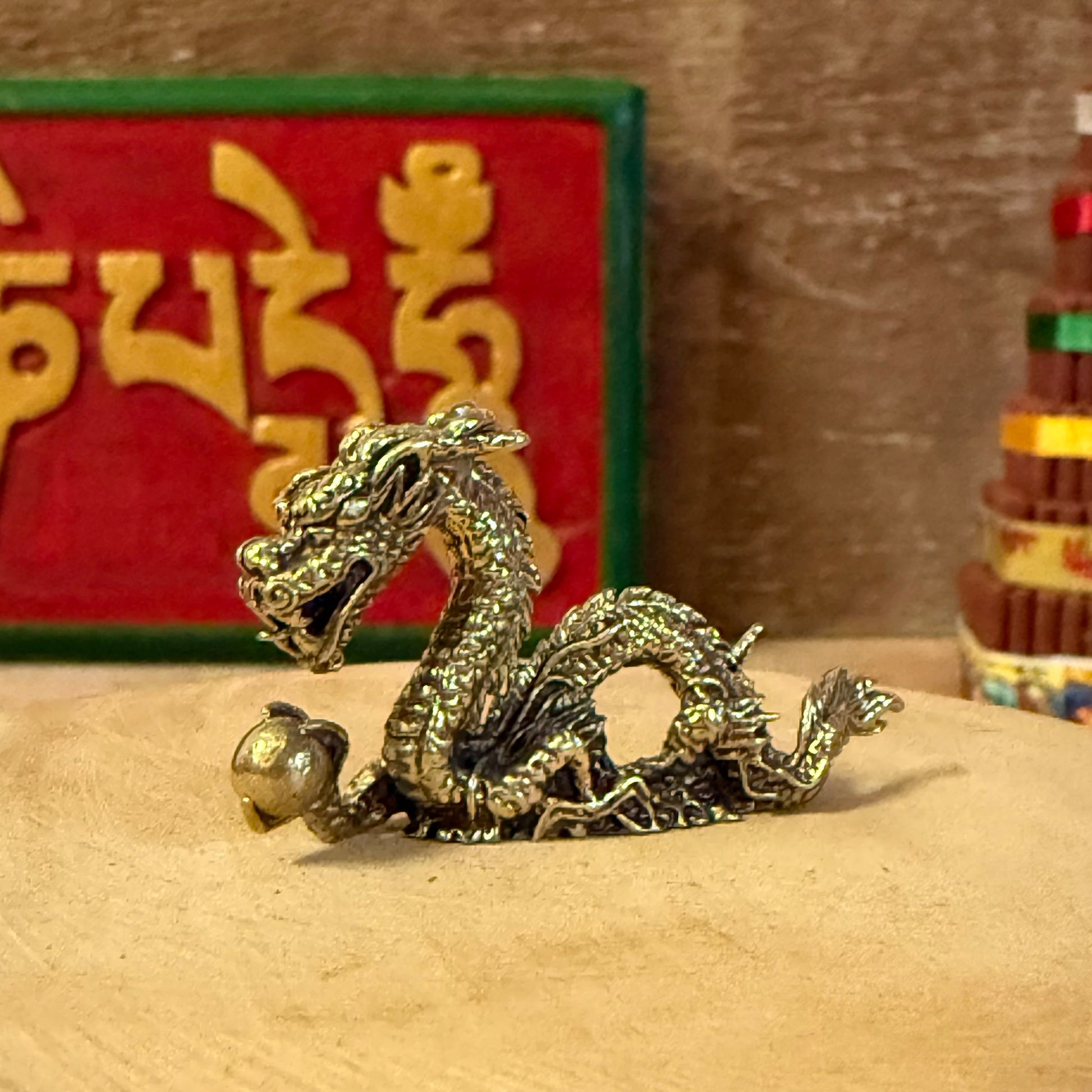 Embodying the ancient spirit of strength and transformation, the Mini Brass Dragon is a finely detailed sculpture handcrafted in Bali from solid brass. Each piece is cast using traditional metalworking techniques, where molten brass is poured into a mould and finished by hand, revealing the dragon’s intricate scales and expressive form.