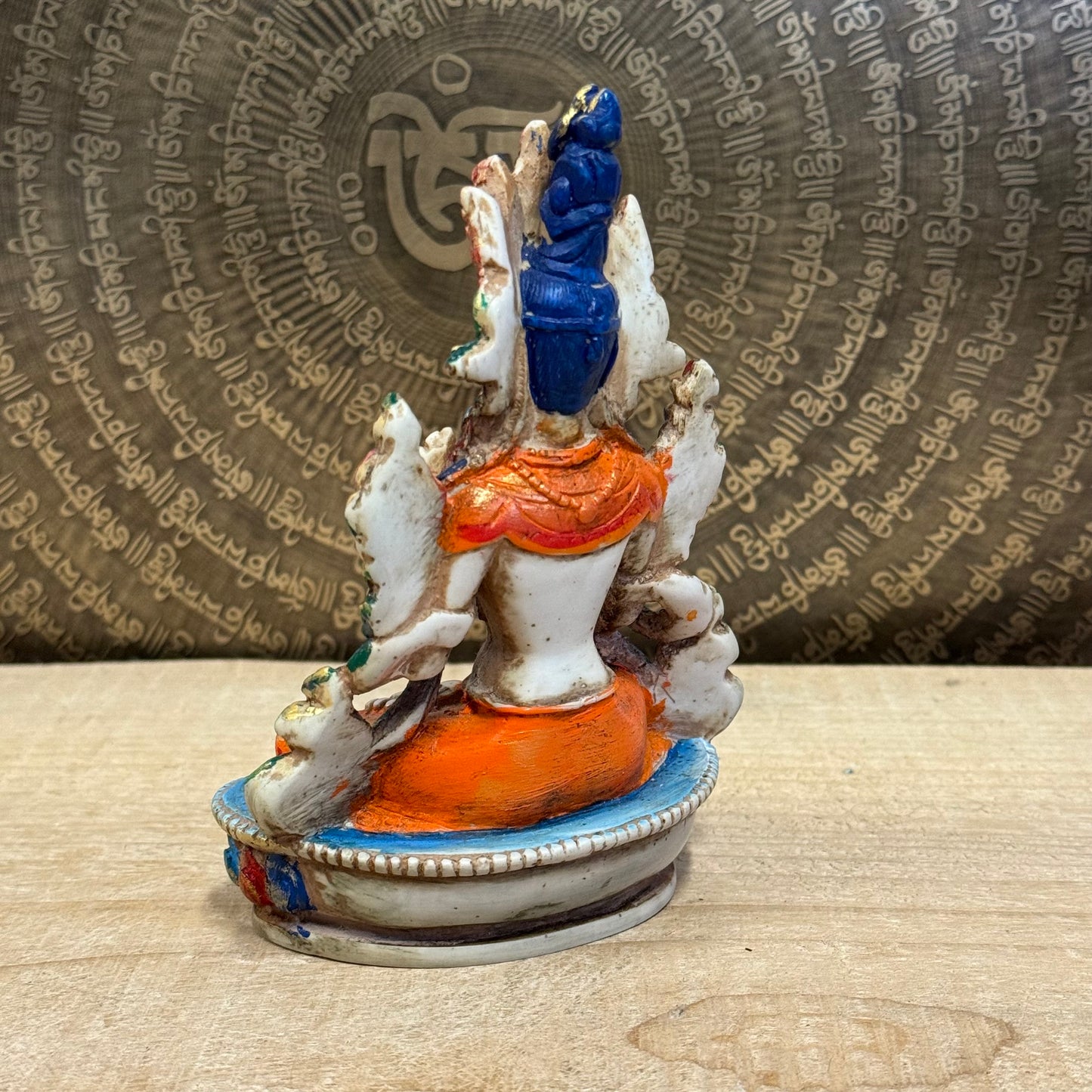 White Tara is known for compassion, long life, healing and serenity and is shown here with her right hand in the varada mudra (blessing pose.) White Tara is distinct from the more commonly seen Green Tara. She is seated in a tranquil, full lotus position as opposed to Green Tara's one foot extended pose. These intricate resin statues are carefully handcrafted In Nepal.

Size: 14.5cm