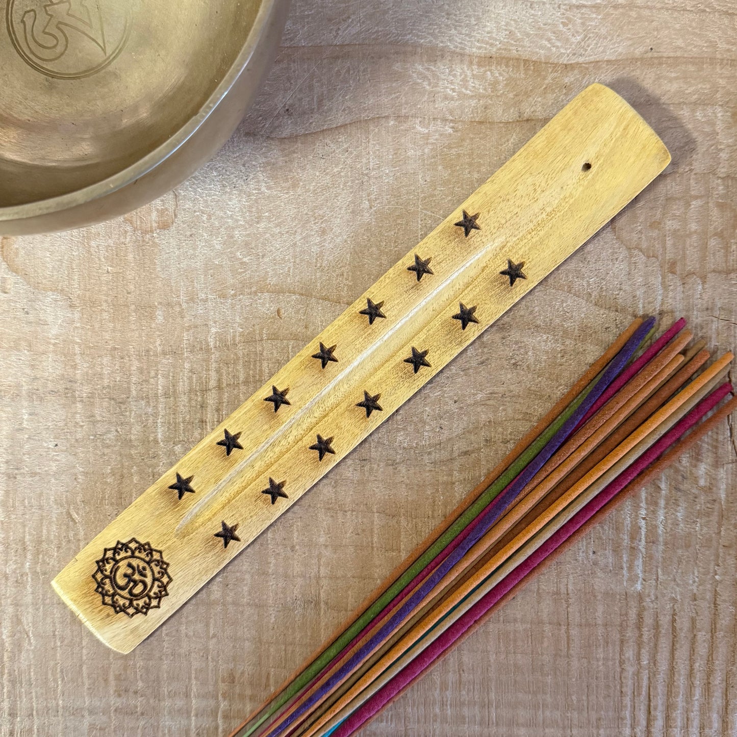 Hand carved mango wood incense ashcatcher with Om symbol. 26cm wooden incense holder for meditation, yoga, and spiritual altar spaces.