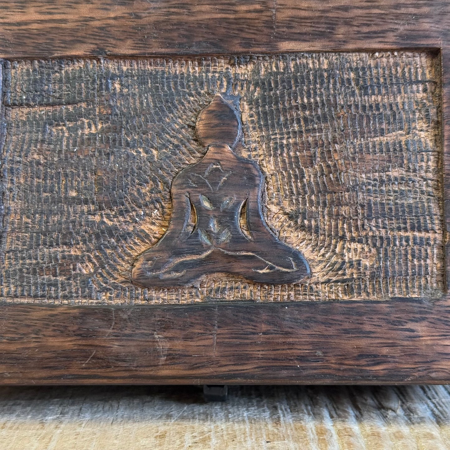 &nbsp;Wooden Keepsake Box - Buddha

Discover the beauty of handcrafted artistry with this lovely mango wood box, hand-carved in India. Perfect for storing trinkets, jewelry, and cherished keepsakes, this box combines charm and functionality with its unique design and sturdy construction.