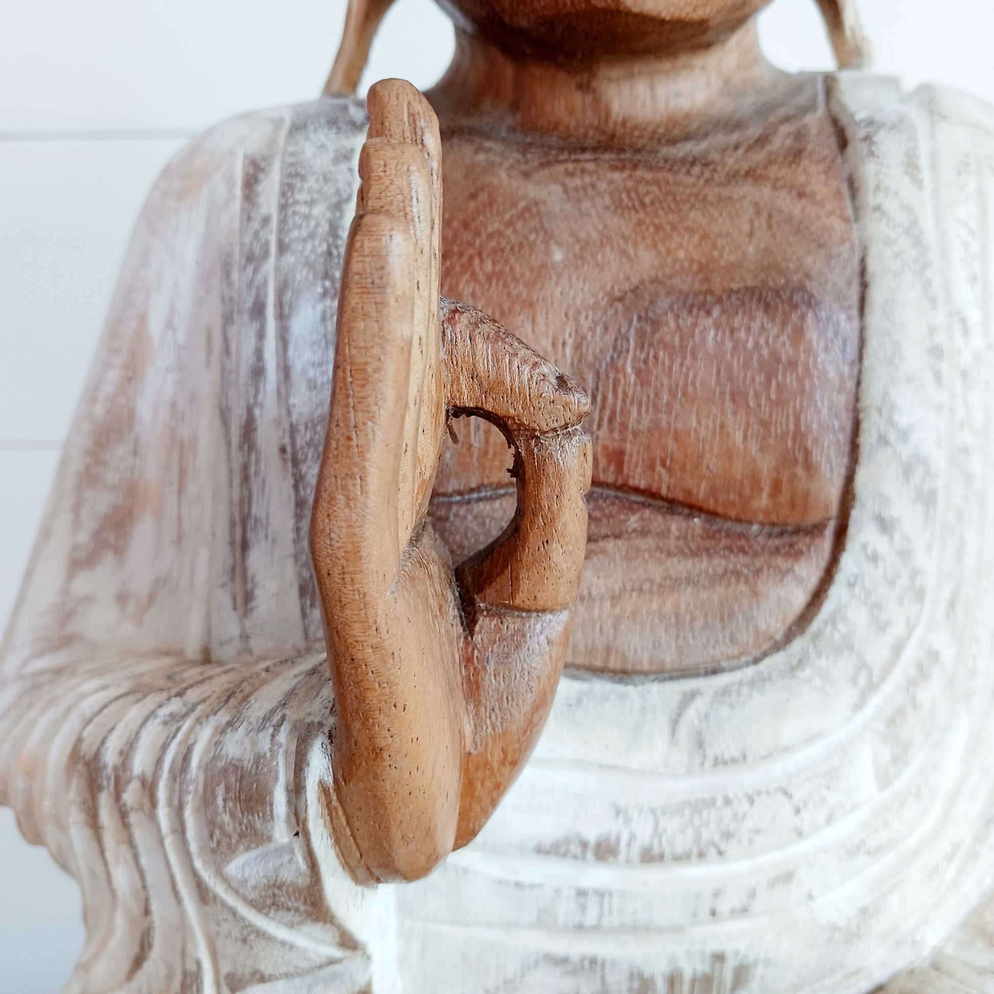 The Buddha is in the Teaching Pose which signifies wisdom, understanding and fulfilling destiny. Both hands are held with thumb and index fingers forming a circle. The Teaching Buddha depicts a particular moment in the life of the Buddha, namely the first sermon the Buddha gave after reaching Enlightenment.