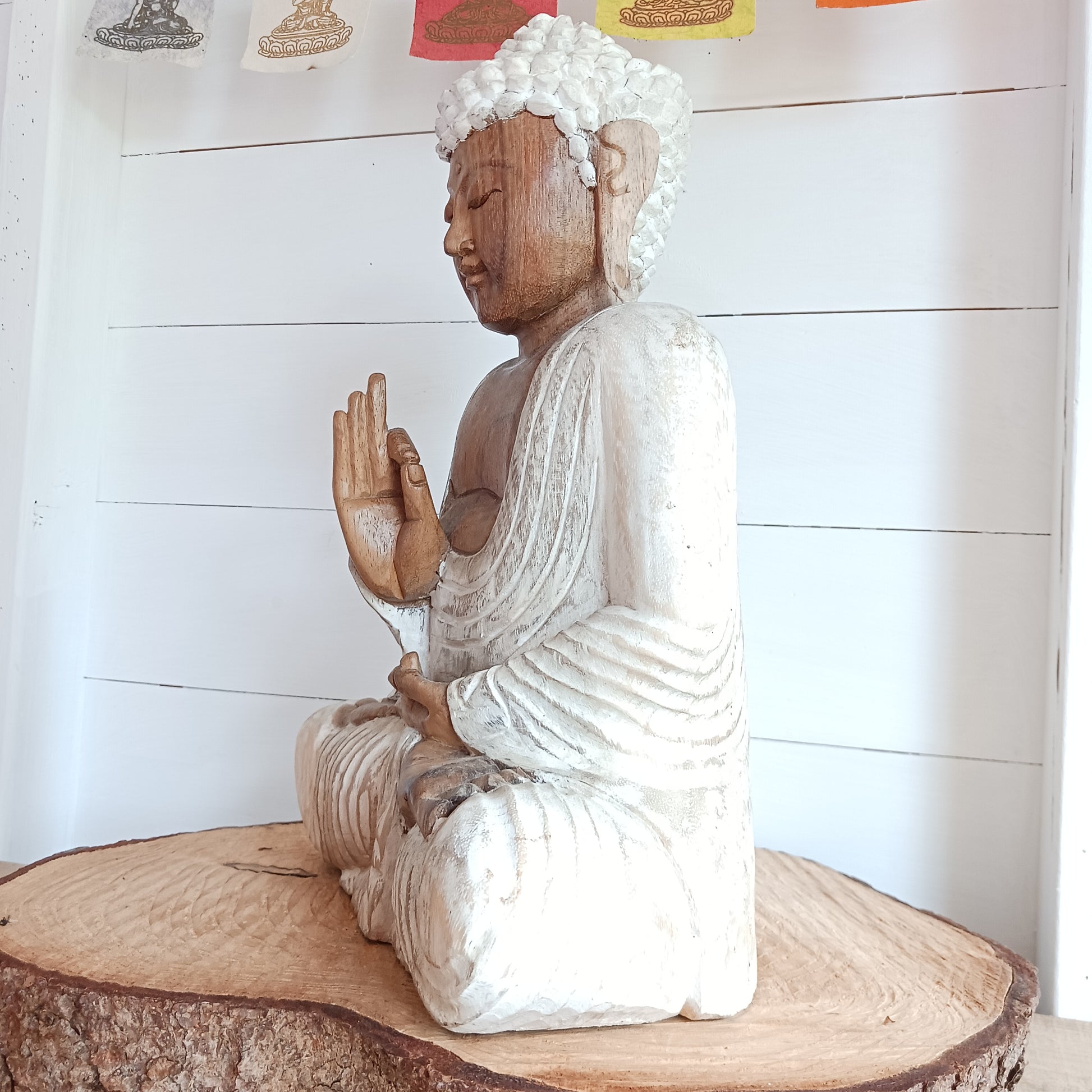 The Buddha is in the Teaching Pose which signifies wisdom, understanding and fulfilling destiny. Both hands are held with thumb and index fingers forming a circle. The Teaching Buddha depicts a particular moment in the life of the Buddha, namely the first sermon the Buddha gave after reaching Enlightenment.