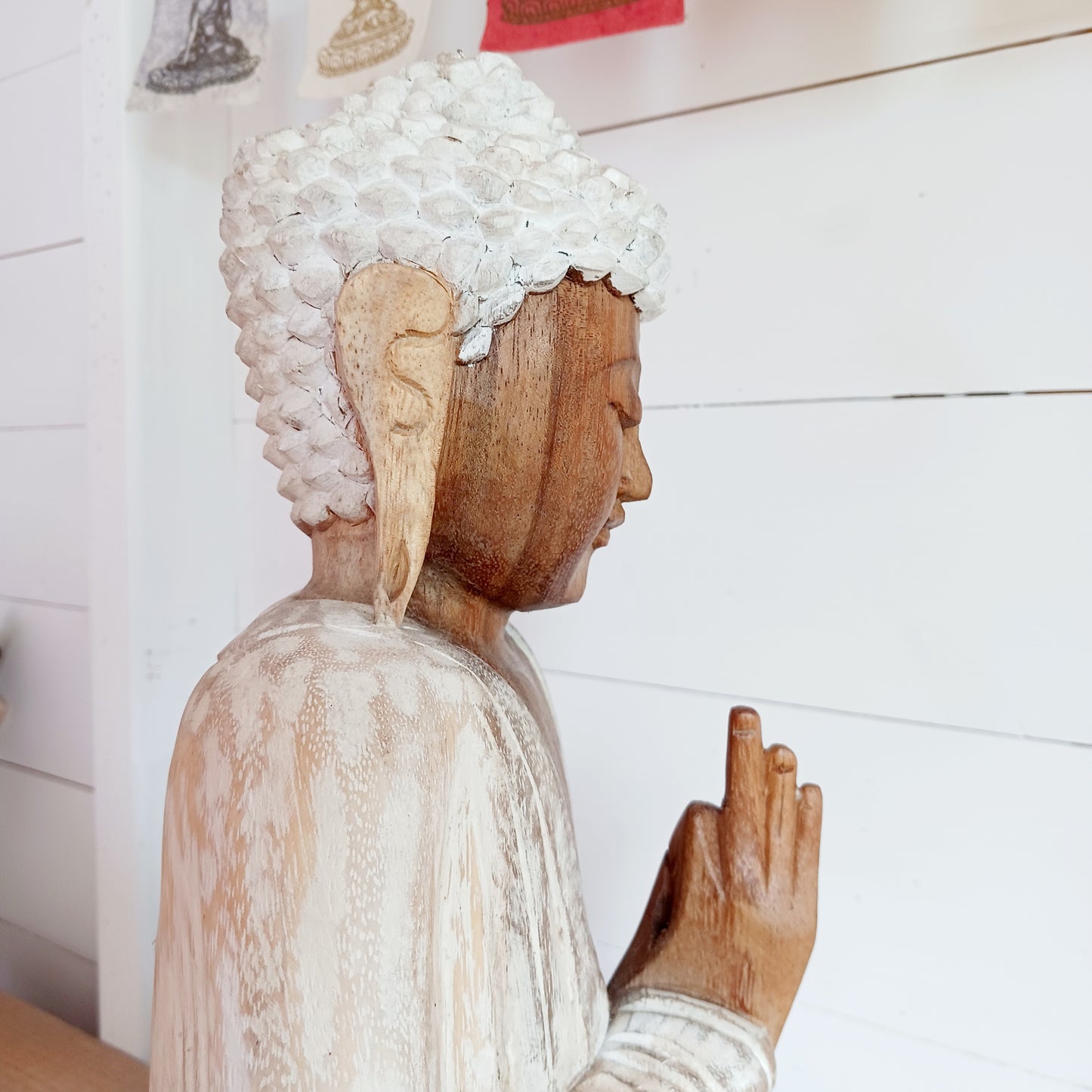 The Buddha is in the Teaching Pose which signifies wisdom, understanding and fulfilling destiny. Both hands are held with thumb and index fingers forming a circle. The Teaching Buddha depicts a particular moment in the life of the Buddha, namely the first sermon the Buddha gave after reaching Enlightenment.