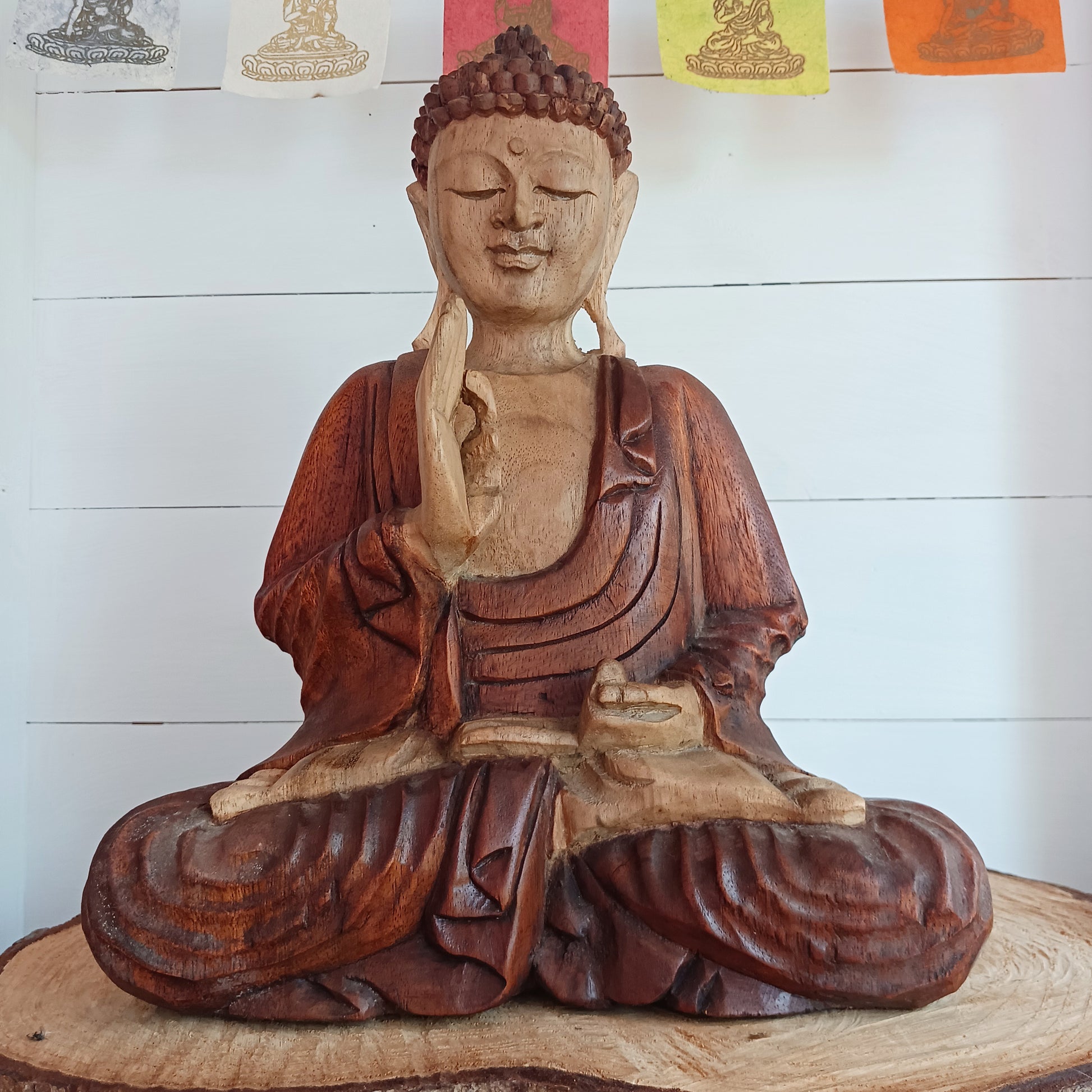 The Buddha is in the Teaching Pose which signifies wisdom, understanding and fulfilling destiny. Both hands are held with thumb and index fingers forming a circle. The Teaching Buddha depicts a particular moment in the life of the Buddha, namely the first sermon the Buddha gave after reaching Enlightenment.