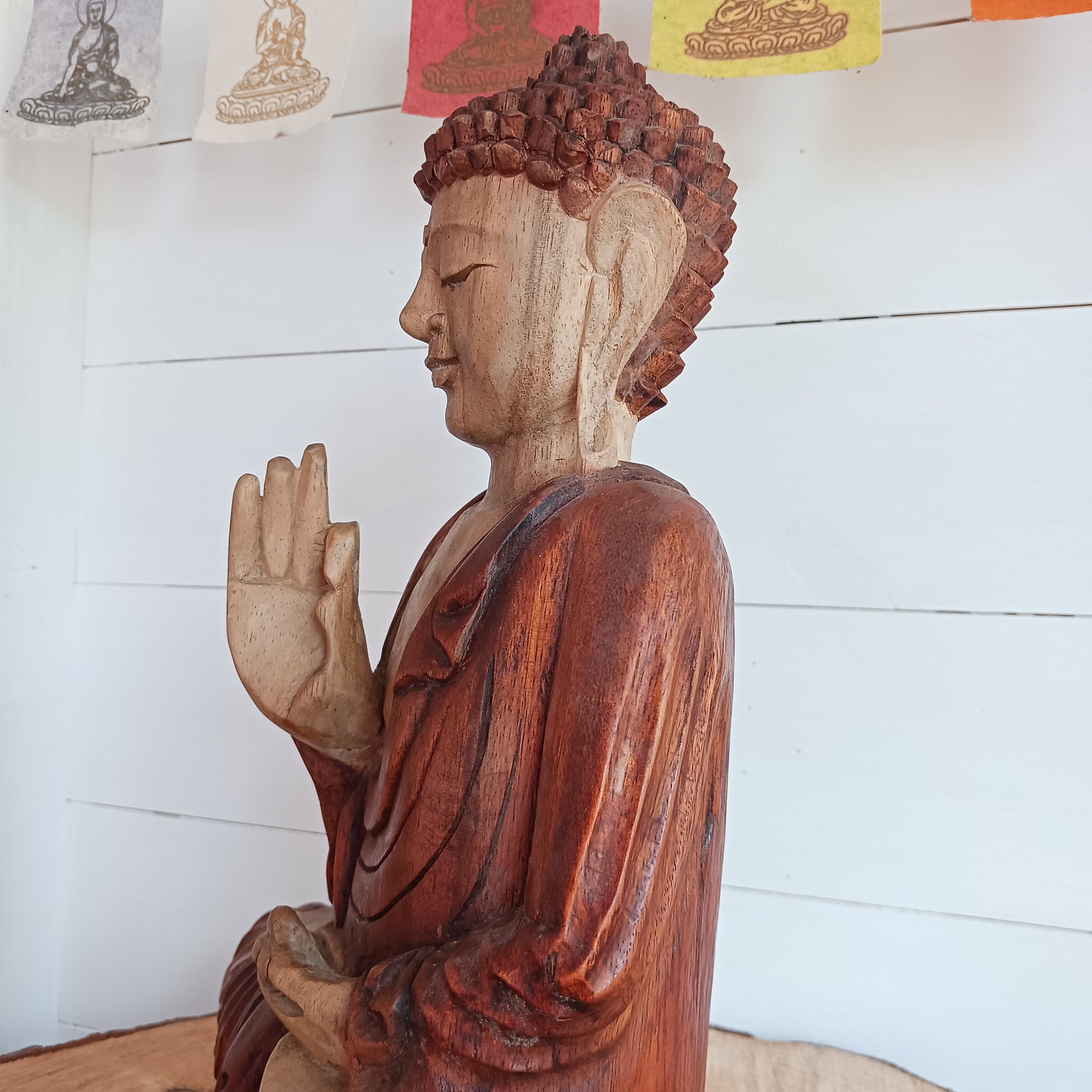 The Buddha is in the Teaching Pose which signifies wisdom, understanding and fulfilling destiny. Both hands are held with thumb and index fingers forming a circle. The Teaching Buddha depicts a particular moment in the life of the Buddha, namely the first sermon the Buddha gave after reaching Enlightenment.