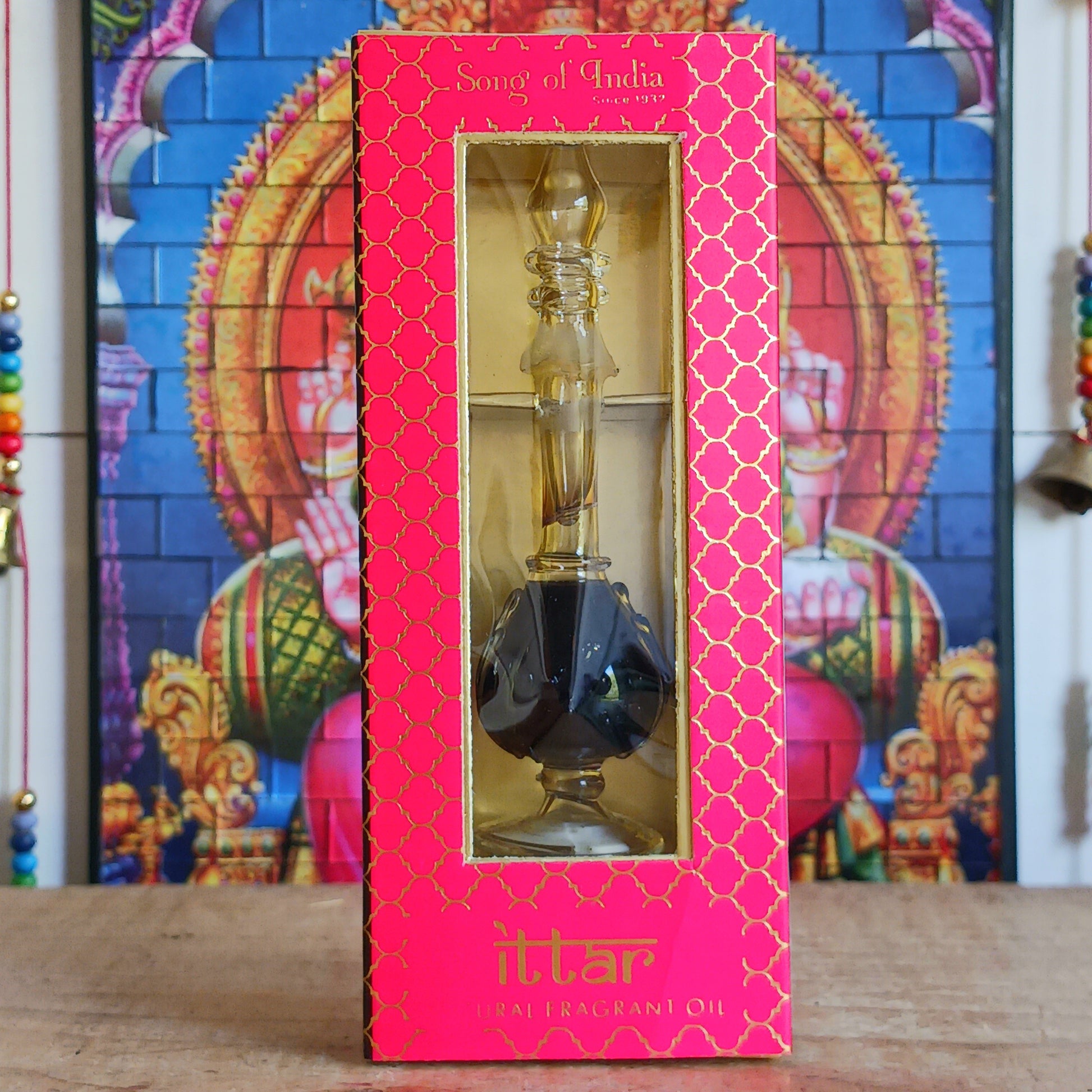 Song of India Natural Aphrodesia Fragrance Oil in hand blown bottle