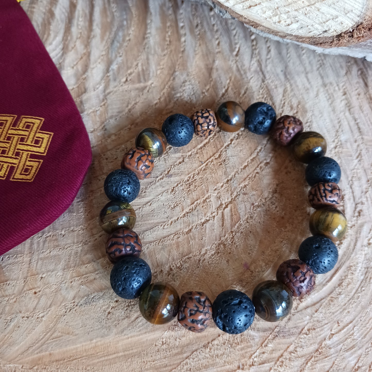 These attractive bracelets are made from Rudraksha Seeds, Tiger's Eye gemstones and Lava Stone.