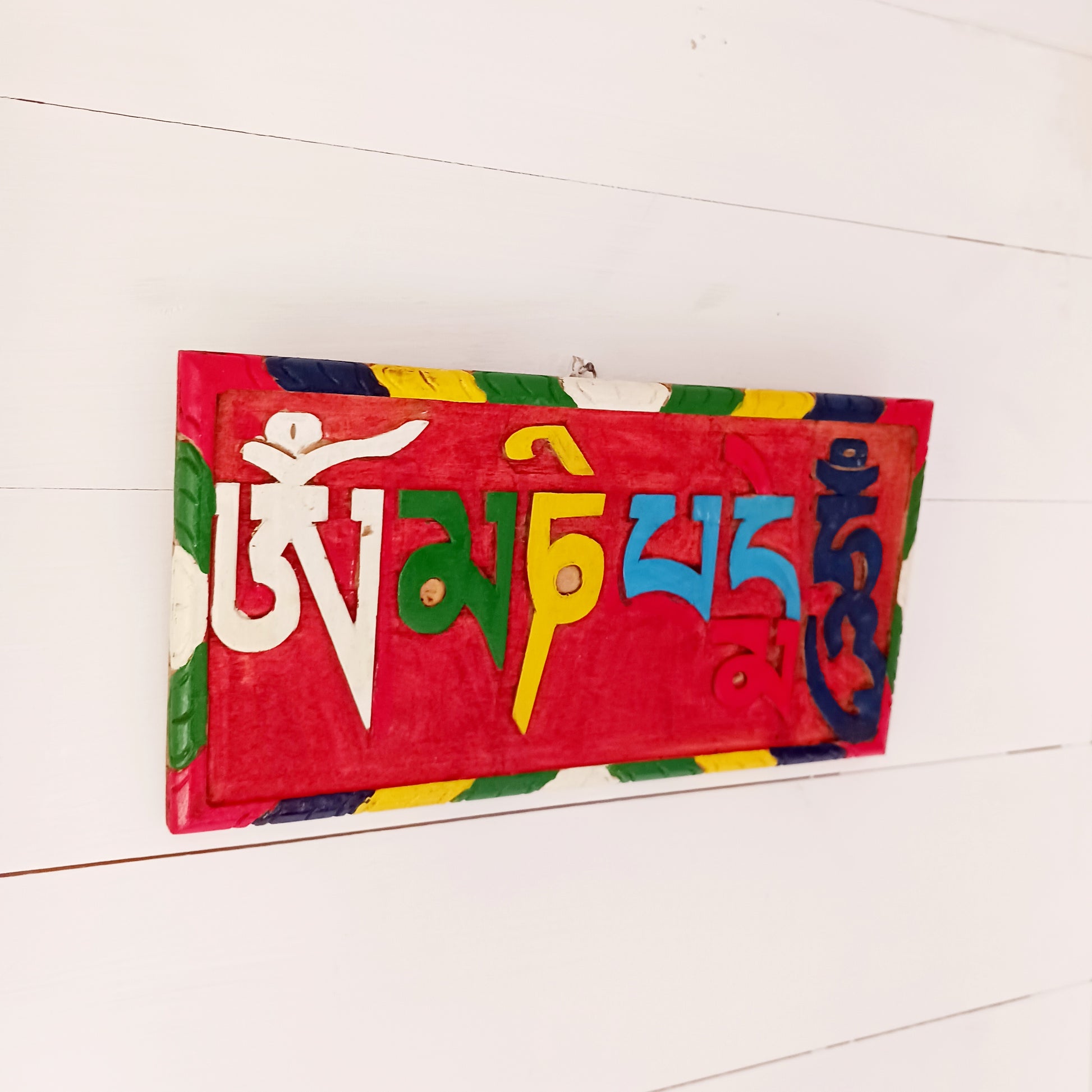 Decorative wooden hand painted Om mani padme hum Buddhist mantra wooden wall hanging.