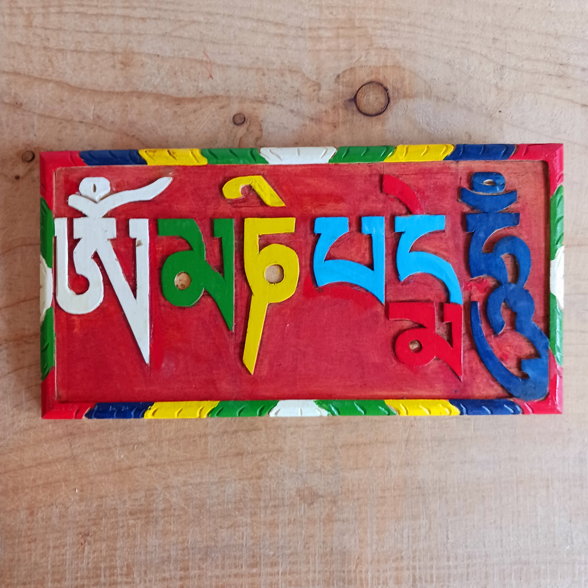 Decorative wooden hand painted Om mani padme hum Buddhist mantra wooden wall hanging.