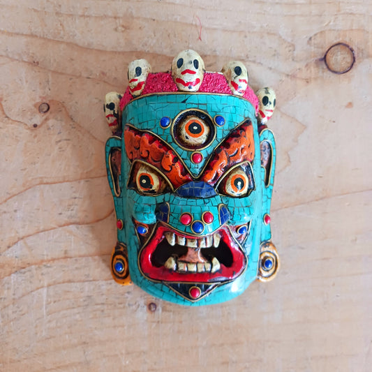 Mahakala is a Dharmapala, a protector of religious law. He is always depicted as an extremely fierce and terrifying deity. His purpose is to help in overcoming negative obstacles on the path to enlightenment.