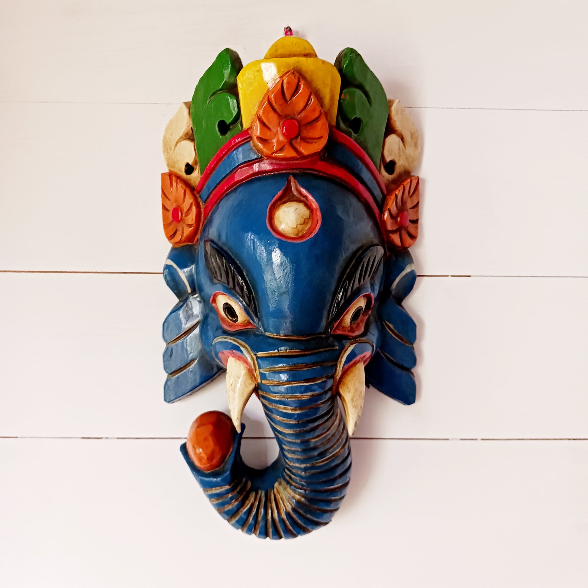 Ganesh, the elephant headed god of wisdom and success is the defender and remover of obstacles and has to be propitiated first before worship to other gods. He is one of the sons of Shiva.