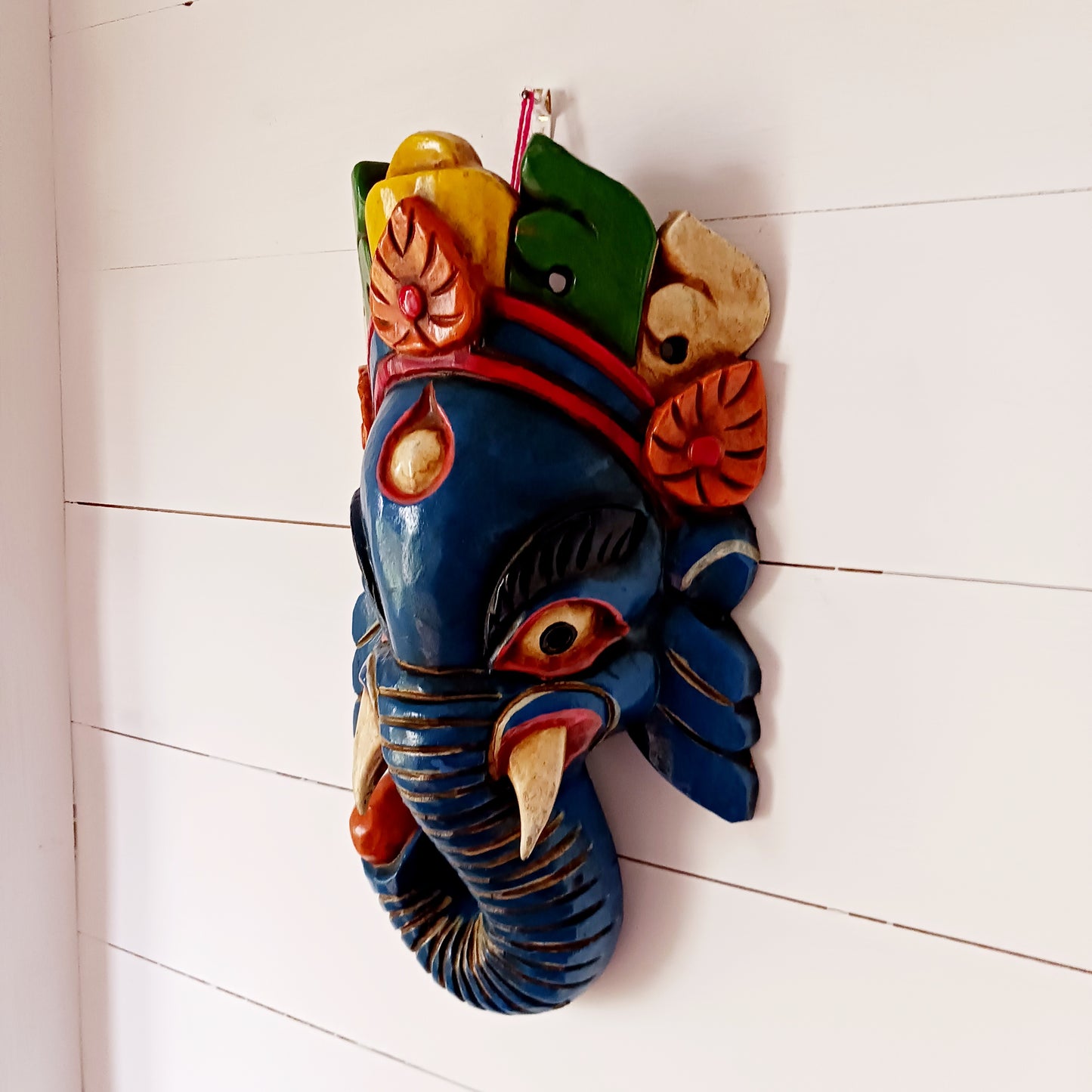 Ganesh, the elephant headed god of wisdom and success is the defender and remover of obstacles and has to be propitiated first before worship to other gods. He is one of the sons of Shiva.